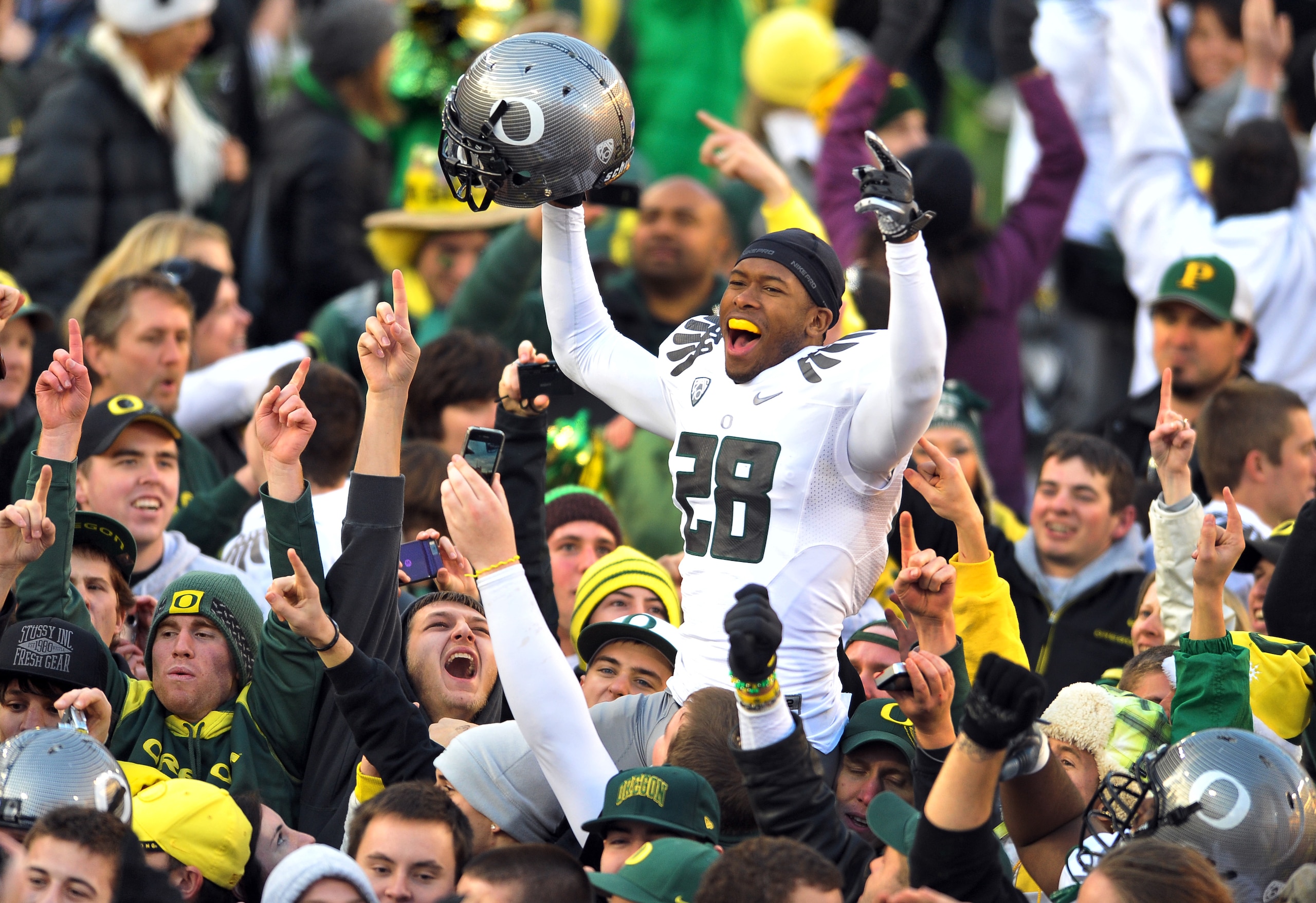 CORVALLIS, OR - DECEMBER 4: Cornerback Scott Grady #28 of the Oregon Ducks celebrates on the field after the game at Reser Stadium on December 4, 2010 in Corvallis, Oregon. he Ducks beat the Beavers 37-20 to likely go on the BCS Championship game at the T CORVALLIS, OR - DECEMBER 4: Cornerback Scott Grady #28 of the Oregon Ducks celebrates on the field after the game at Reser Stadium on December 4, 2010 in Corvallis, Oregon. he Ducks beat the Beavers 37-20 to likely go on the BCS Championship game at the T