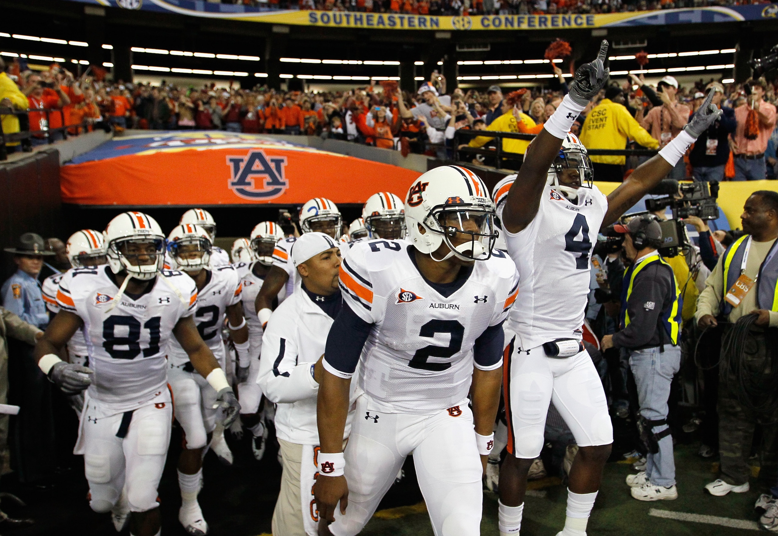 ATLANTA, GA - DECEMBER 04: Quarterback Cam Newton #2 of the Auburn Tigers leads the team out to face the South Carolina Gamecocks during the 2010 SEC Championship at Georgia Dome on December 4, 2010 in Atlanta, Georgia. (Photo by Kevin C. Cox/Getty Imag ATLANTA, GA - DECEMBER 04: Quarterback Cam Newton #2 of the Auburn Tigers leads the team out to face the South Carolina Gamecocks during the 2010 SEC Championship at Georgia Dome on December 4, 2010 in Atlanta, Georgia. (Photo by Kevin C. Cox/Getty Imag