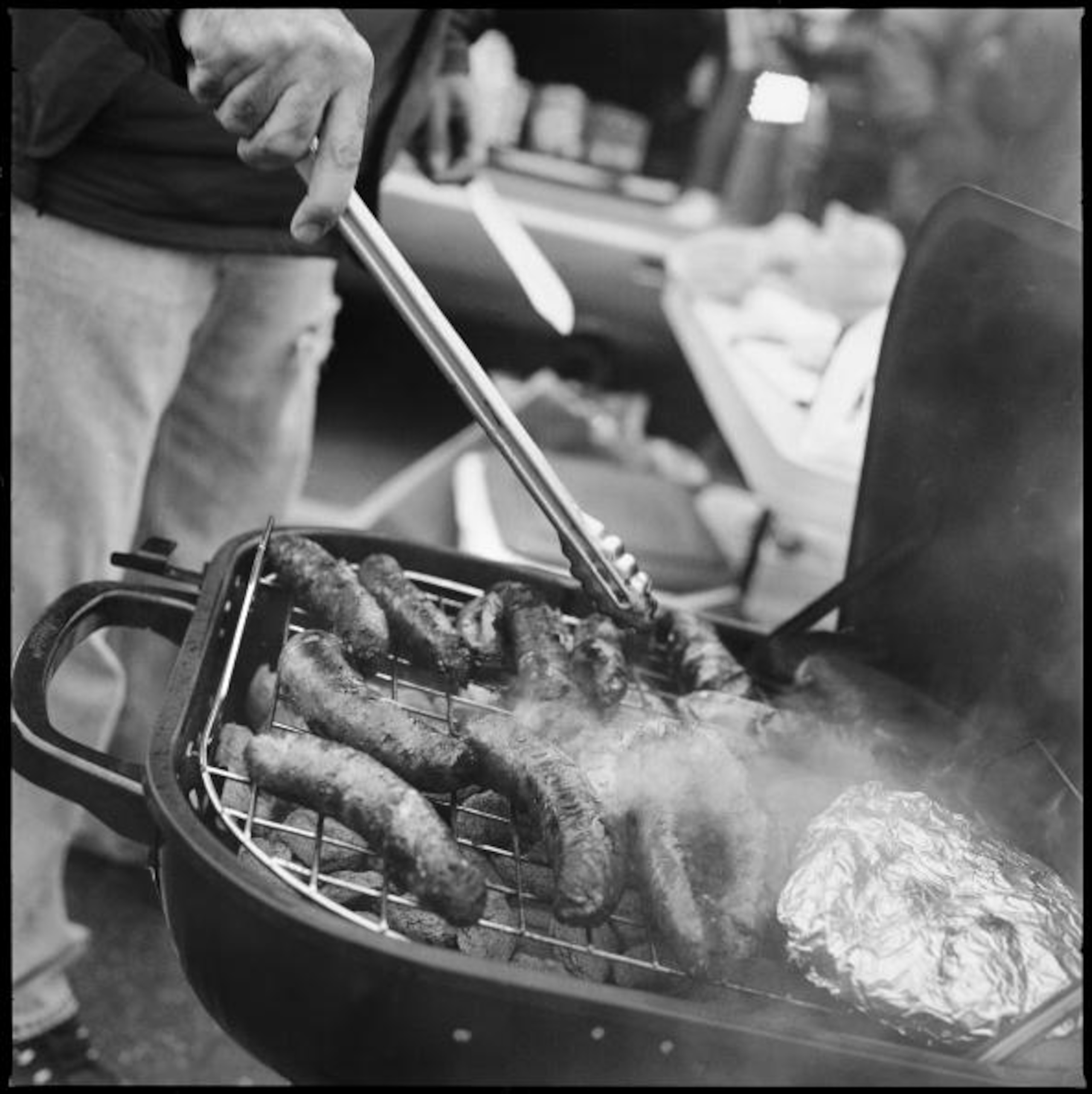 PHILADELPHIA - NOVEMBER 18: A tailgater cooks sausages prior to the start of the NFL game between the Miami Dolphins and the Philadelphia Eagles at Lincoln Financial Field on November 18, 2007 in Philadelphia, Pennsylvania. Born and bred into American spo PHILADELPHIA - NOVEMBER 18: A tailgater cooks sausages prior to the start of the NFL game between the Miami Dolphins and the Philadelphia Eagles at Lincoln Financial Field on November 18, 2007 in Philadelphia, Pennsylvania. Born and bred into American spo