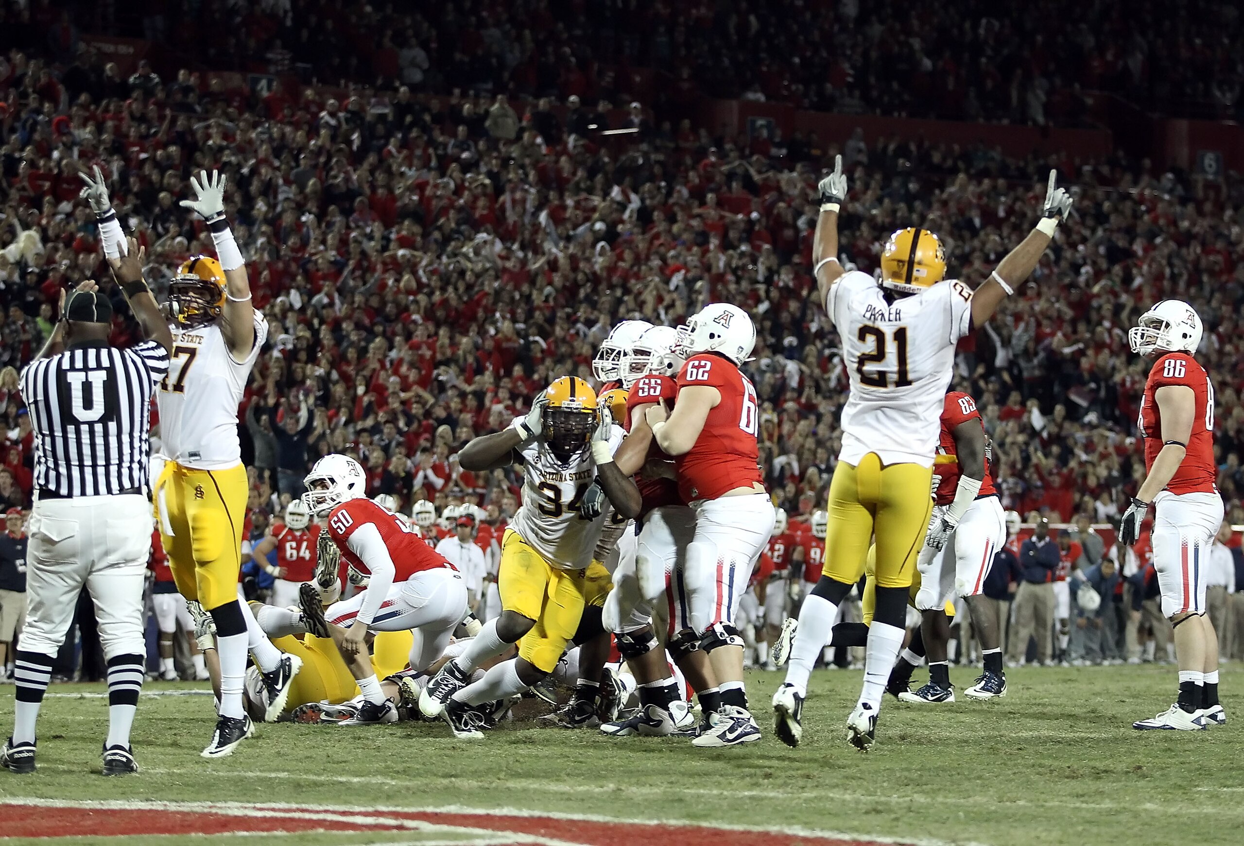 TUCSON, AZ - DECEMBER 02: Defensive end James Brooks #34 (C) and the Arizona State Sun Devils celebrate blocking an extra point to defeat the Arizona Wildcats in double overtime of the college football game at Arizona Stadium on December 2, 2010 in Tucso TUCSON, AZ - DECEMBER 02: Defensive end James Brooks #34 (C) and the Arizona State Sun Devils celebrate blocking an extra point to defeat the Arizona Wildcats in double overtime of the college football game at Arizona Stadium on December 2, 2010 in Tucso