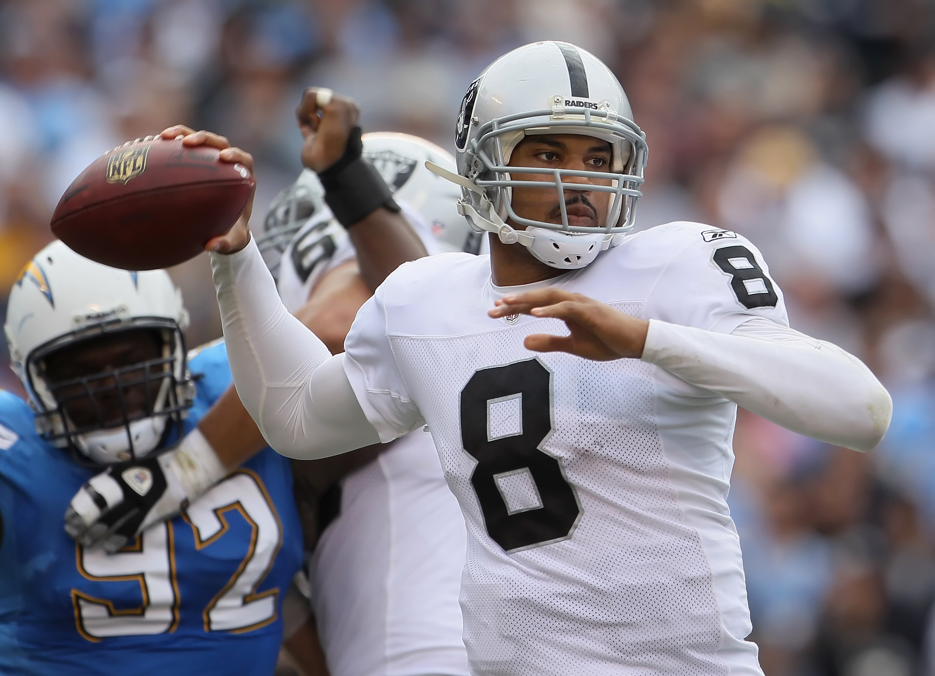 SAN DIEGO - DECEMBER 05:  Quarterback Jason Campbell #8 the Oakland Raiders drops back to pass against the San Diego Chargers during the second quarter at Qualcomm Stadium on December 5, 2010 in San Diego, California. The Raiders defeated the Chargers 28-