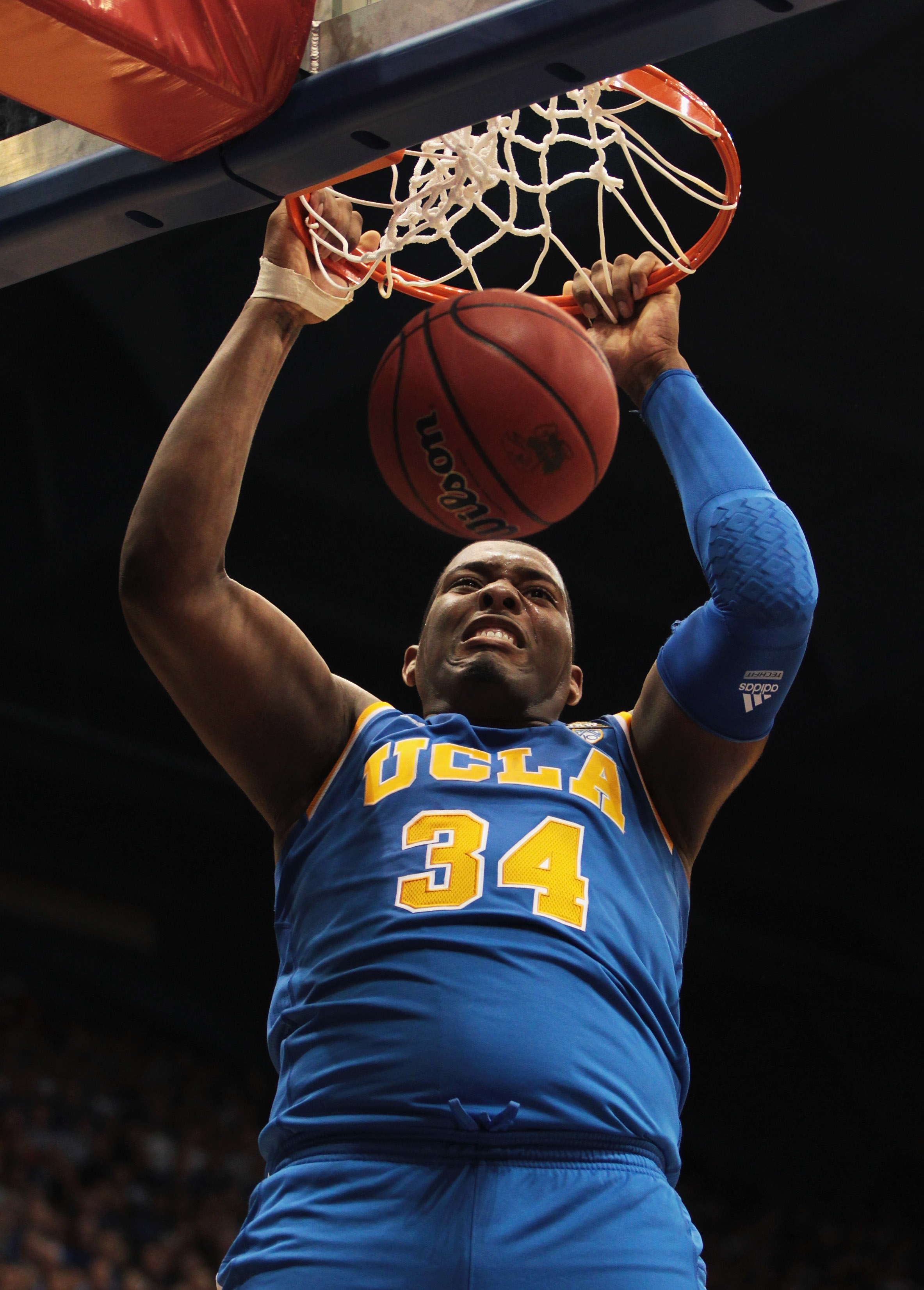 LAWRENCE, KS - DECEMBER 02: Joshua Smith #34 of the UCLA Bruins dunks during the game against the Kansas Jayhawks on December 2, 2010 at Allen Fieldhouse in Lawrence, Kansas. (Photo by Jamie Squire/Getty Images)