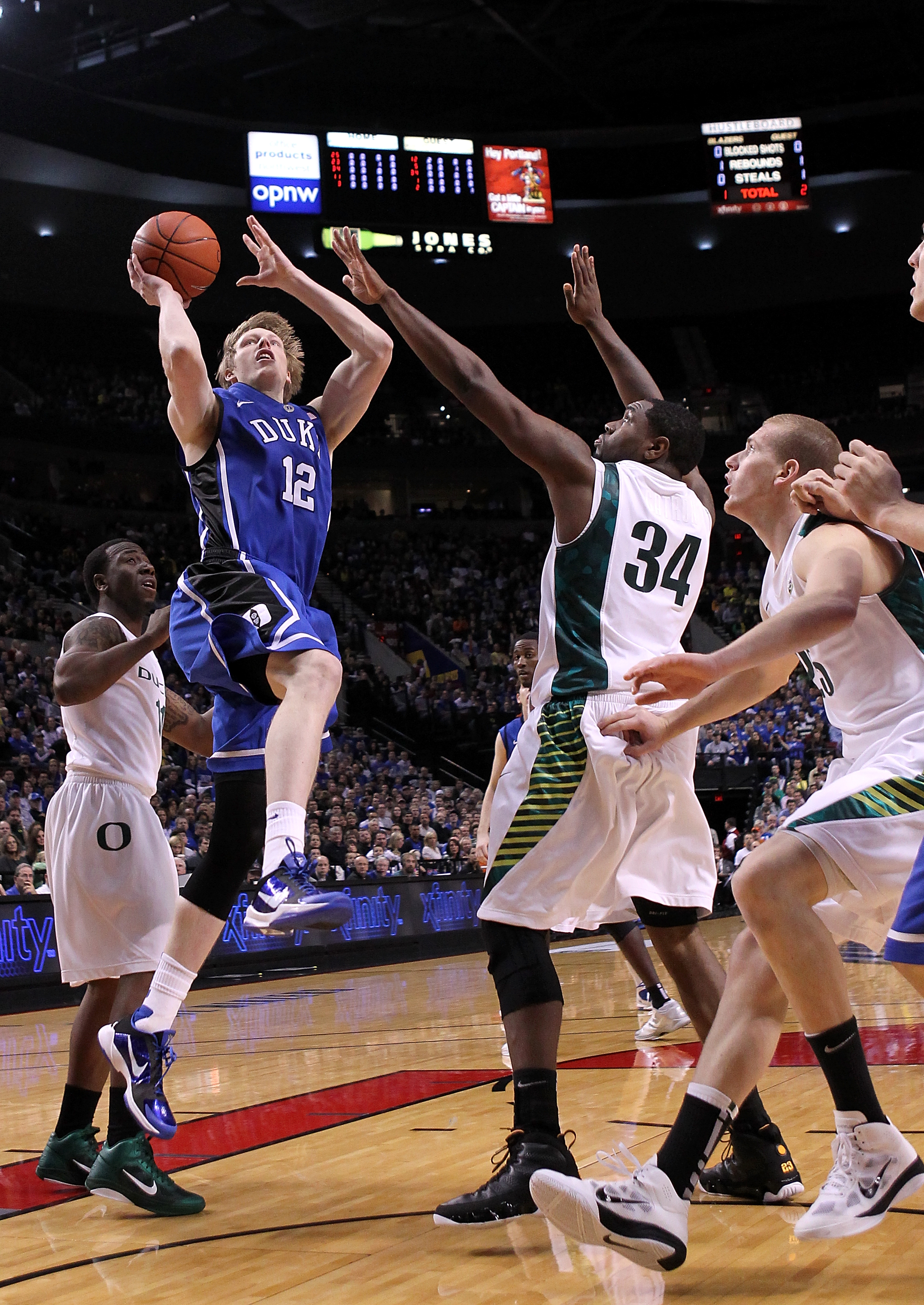 PORTLAND, OR - NOVEMBER 27: Kyle Singler #12 of the Duke Blue Devils shoots against the Oregon Ducks on November 27, 2010 at the Rose Garden in Portland, Oregon. (Photo by Jonathan Ferrey/Getty Images)