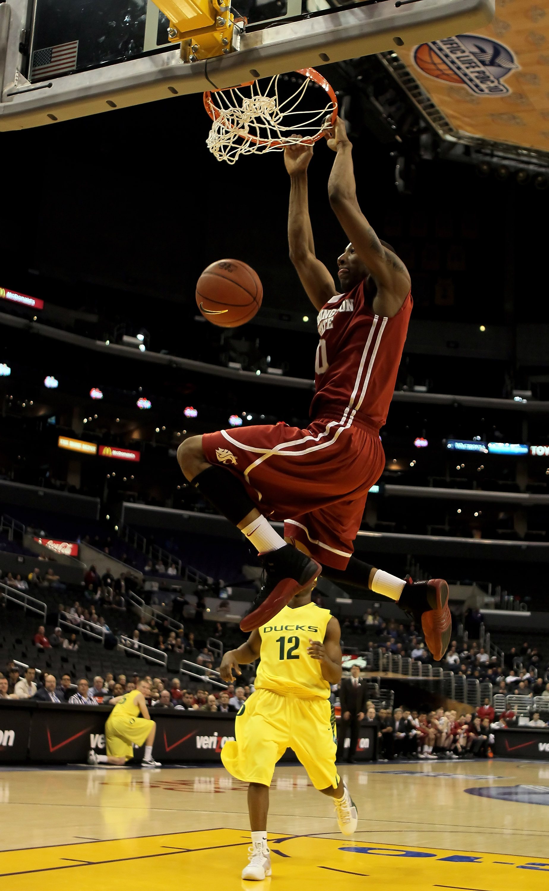 LOS ANGELES, CA - MARCH 10: Marcus Capers #0 of the Washington State Cougars dunks the ball against the Oregon Ducks in the half during the first round of the Pac-10 Basketball Tournament at Staples Center on March 10, 2010 in Los Angeles, California. (