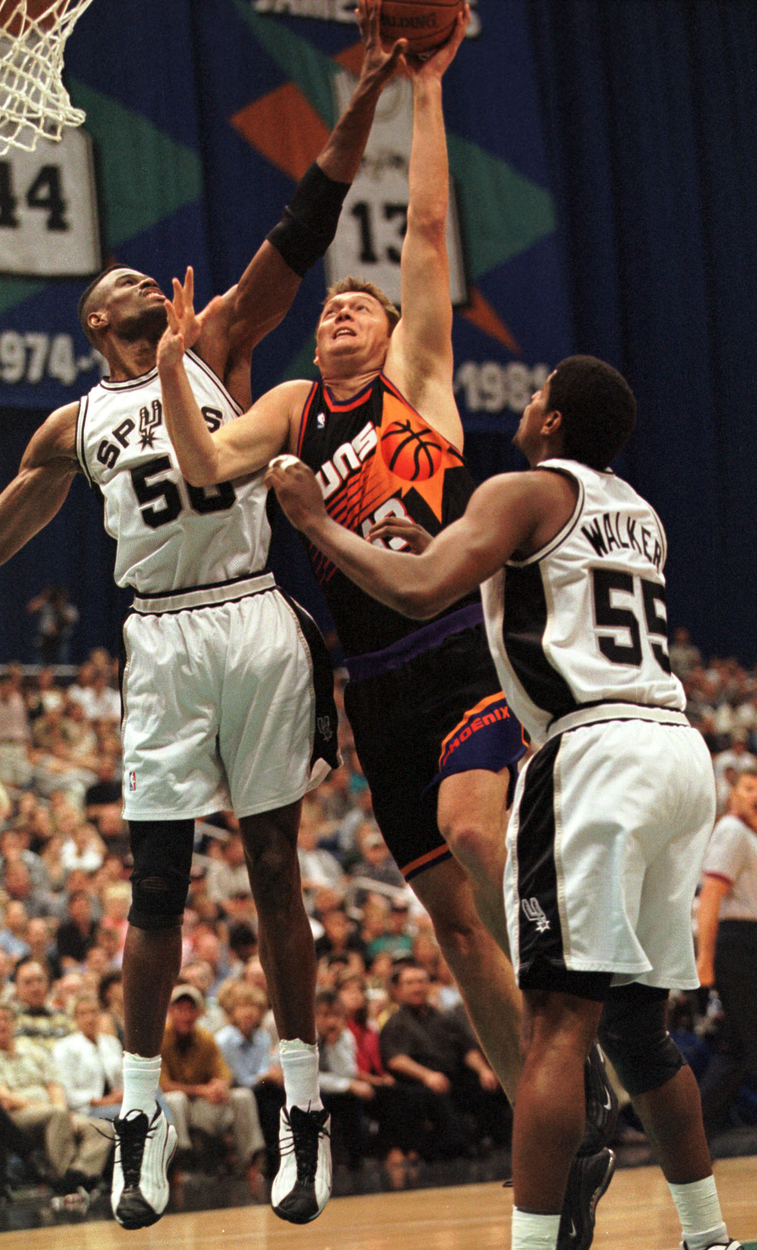 22 Apr 2000:  David Robinson #50 of the San Antonio Spurs blocks a shot by Luc Longley #13 of the Phoenix Suns during the NBA Playoff game at the Alamo Dome in San Antonio,Texas.    Mandatory Credit: Allsport USA/ALLSPORT