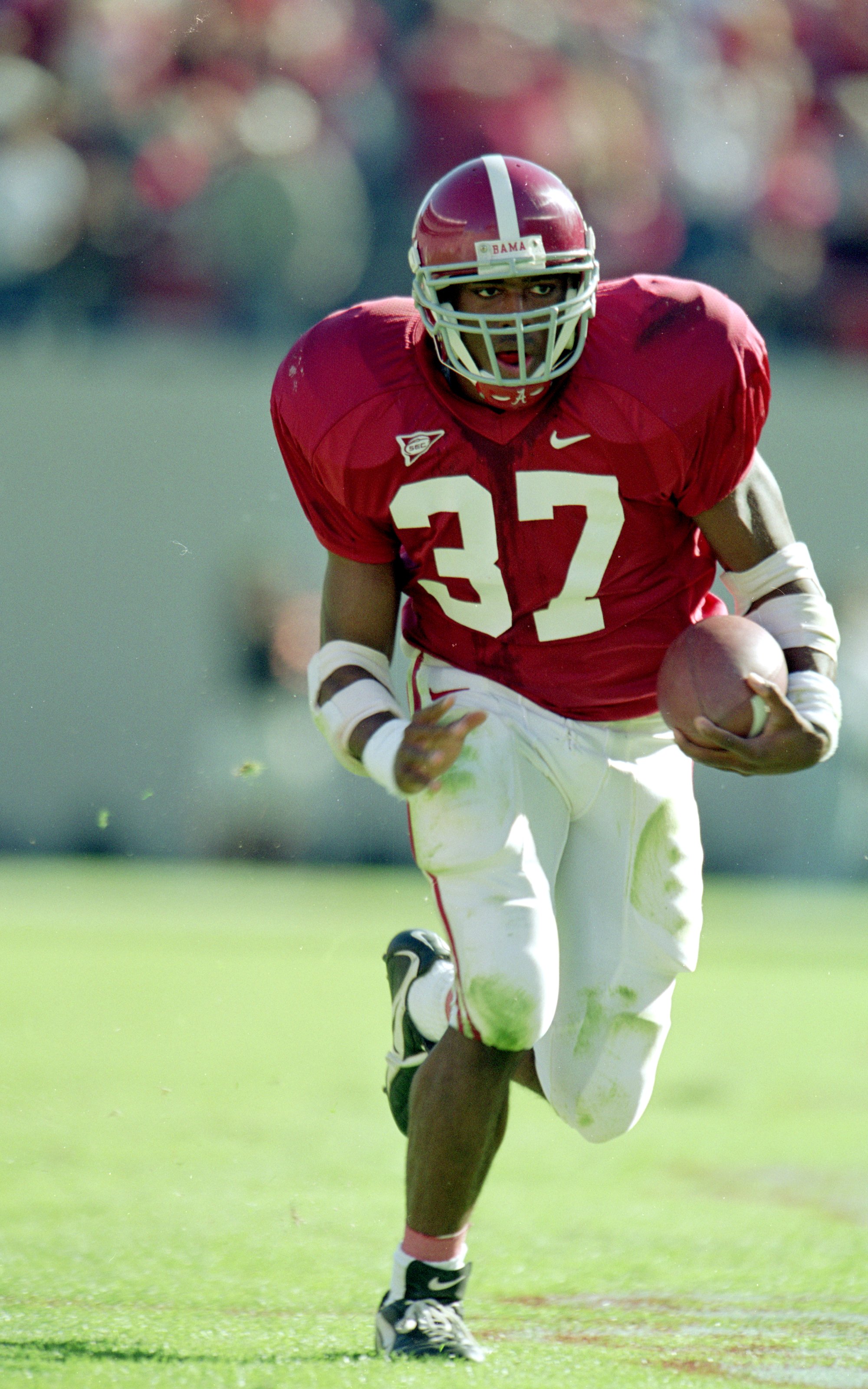 23 Oct 1999: Shaun Alexander #37 of the Alabama Crimson Tide  carries the ball during the game against the Tennessee Volunteers at the Bryant Denny Stadium in Tuscaloosa, Alabama. The Volunteers defeated the Crimson Tide 21-7. Mandatory Credit: Elsa Hasch
