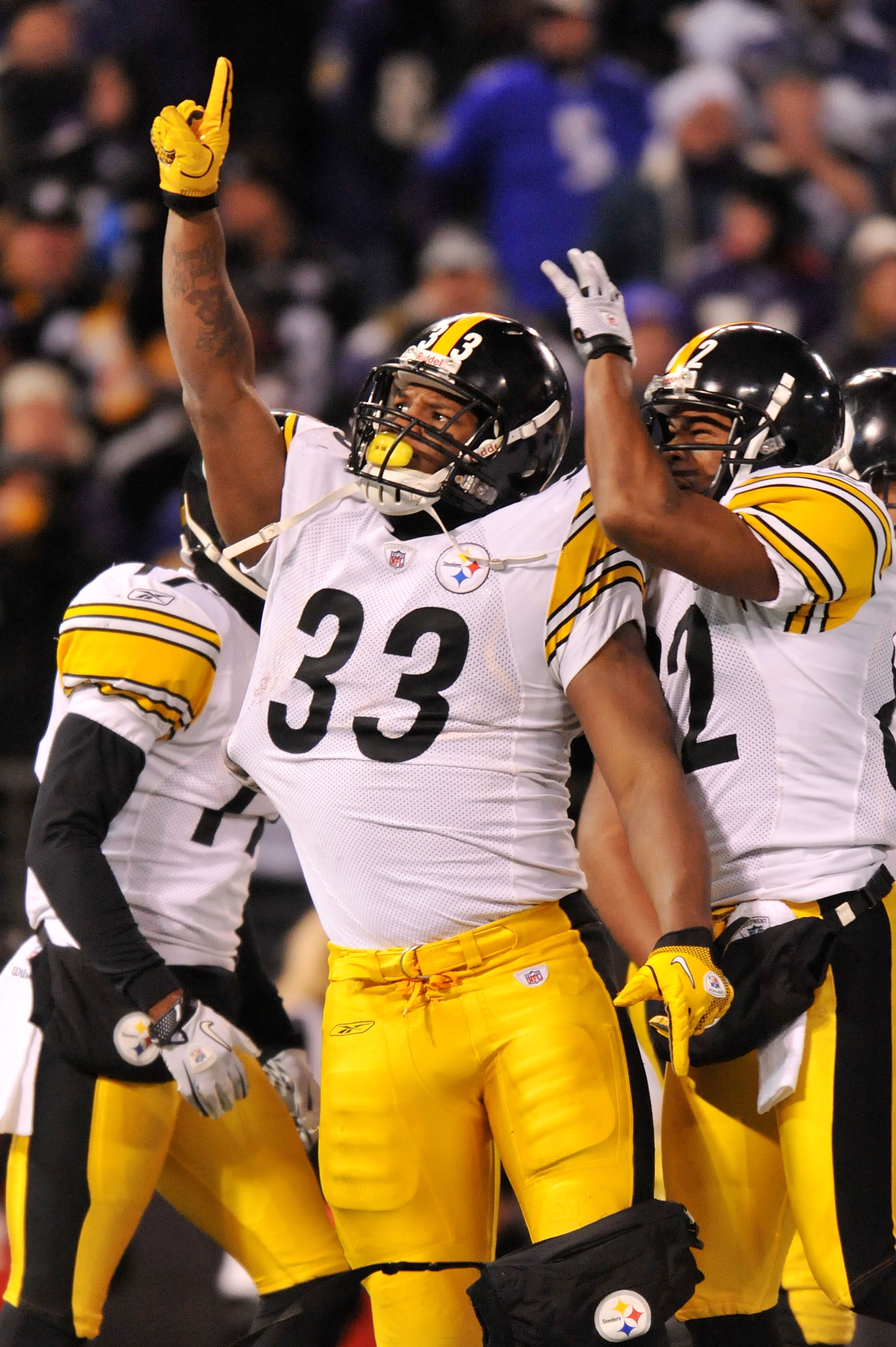 Pittsburgh Steelers running back Isaac Redman (33) is hit by