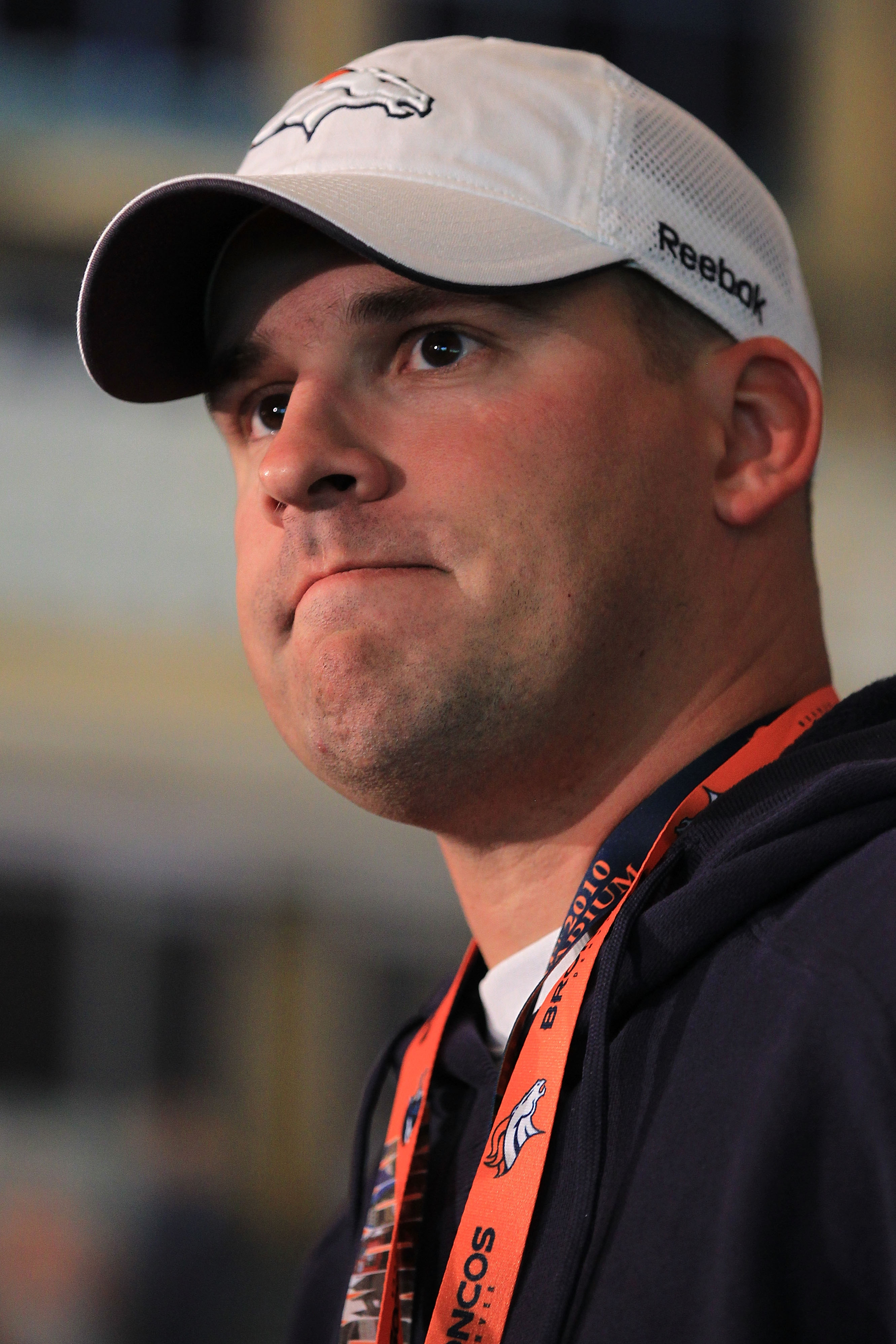 LONDON, ENGLAND - OCTOBER 29:  Head coach of the Denver Broncos Josh McDaniels speaks to the media during a press conference prior to the start of a team training session at The Brit Oval on October 29, 2010 in London, England. The Denver Broncos will pla