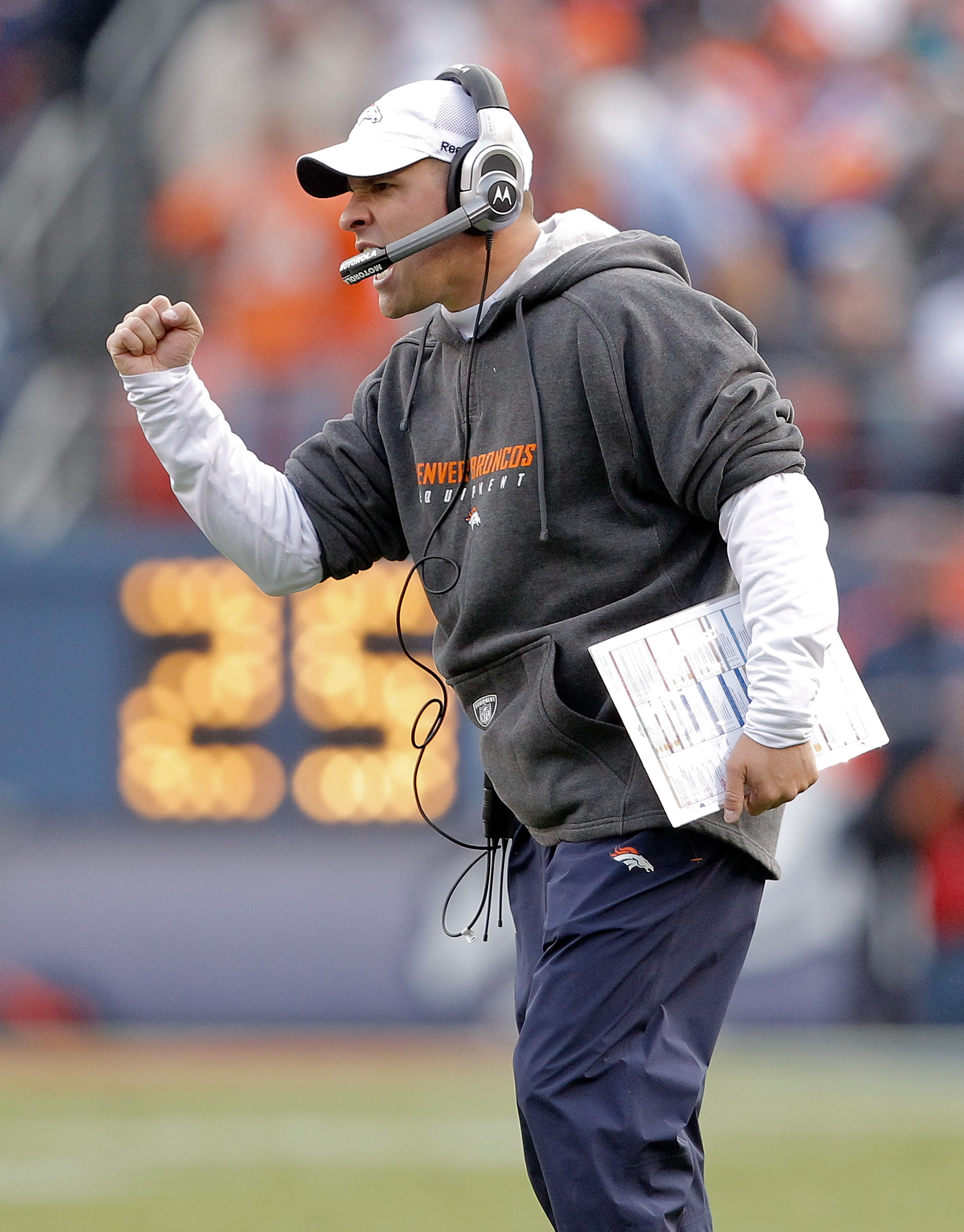 DENVER - NOVEMBER 14:  Head coach Josh McDaniels of the Denver Broncos celebrates a touchdown on the sidelines against the Kansas City Chiefs during the second quarter at INVESCO Field at Mile High on November 14, 2010 in Denver, Colorado. The Denver Bron