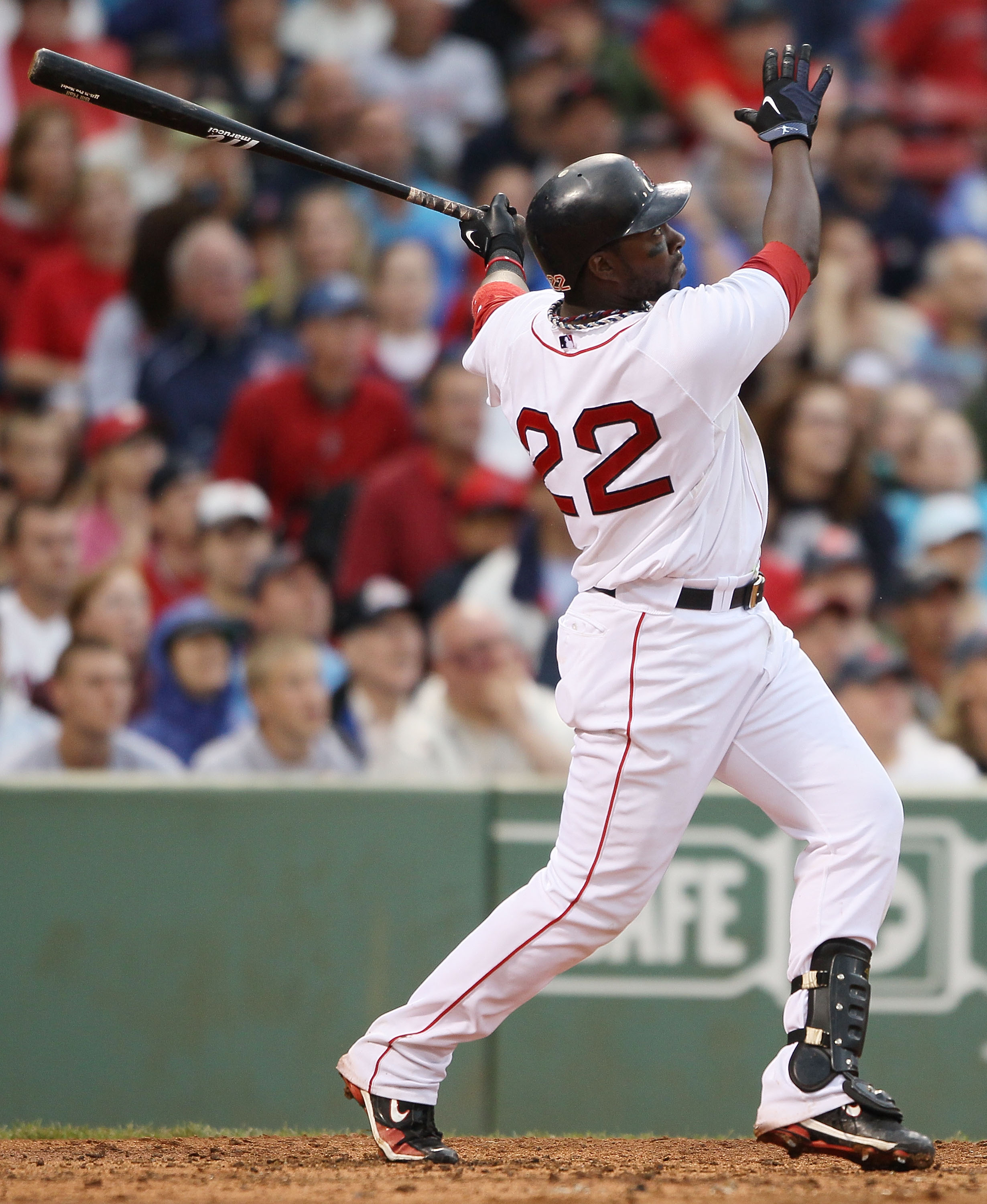BOSTON - AUGUST 22:  Bill Hall #22 of the Boston Red Sox hits a two run homer in the fifth inning against the Toronto Blue Jays on August 22, 2010 at Fenway Park in Boston, Massachusetts.  (Photo by Elsa/Getty Images)