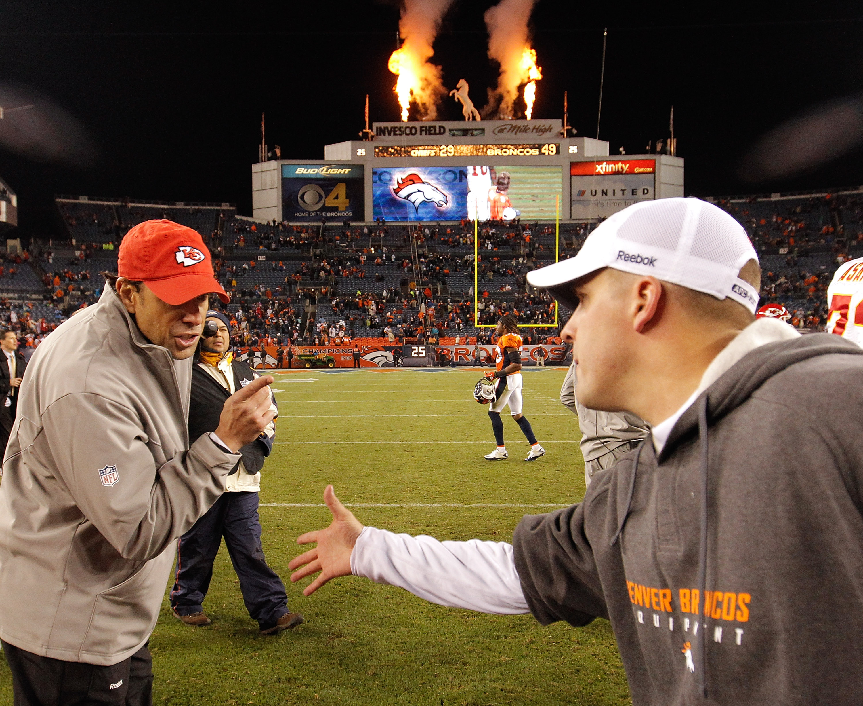 DENVER - NOVEMBER 14:  Head coach Todd Haley of the Kansas City Chiefs has some unwelcome words with head coach Josh McDaniels of the Denver Broncos as he refuses to shake his hand after the Broncos 49-29 win at INVESCO Field at Mile High on November 14,