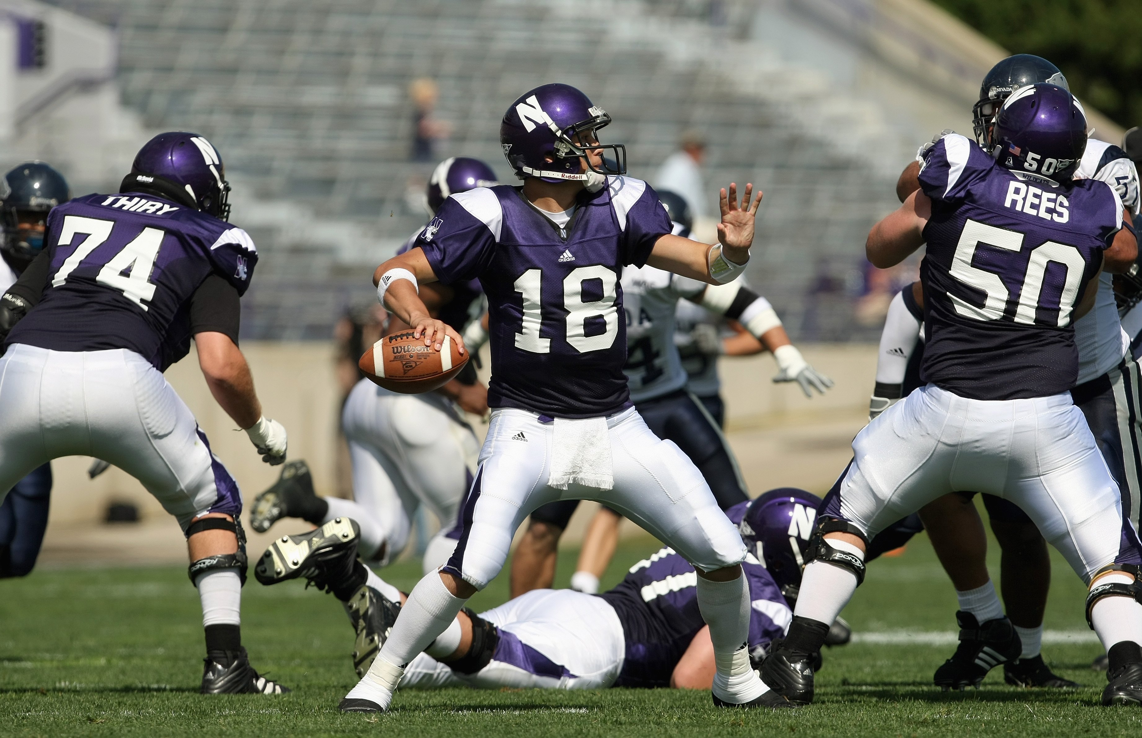 EVANSTON, IL - SEPTEMBER 8: Quarterback C.J. Bacher #18 of the Northwestern Wildcats passes the ball during the game against the Nevada Wolf Pack on September 8, 2007 at Ryan Field at Northwestern University in Evanston, Illinois. (Photo by Jonathan Danie