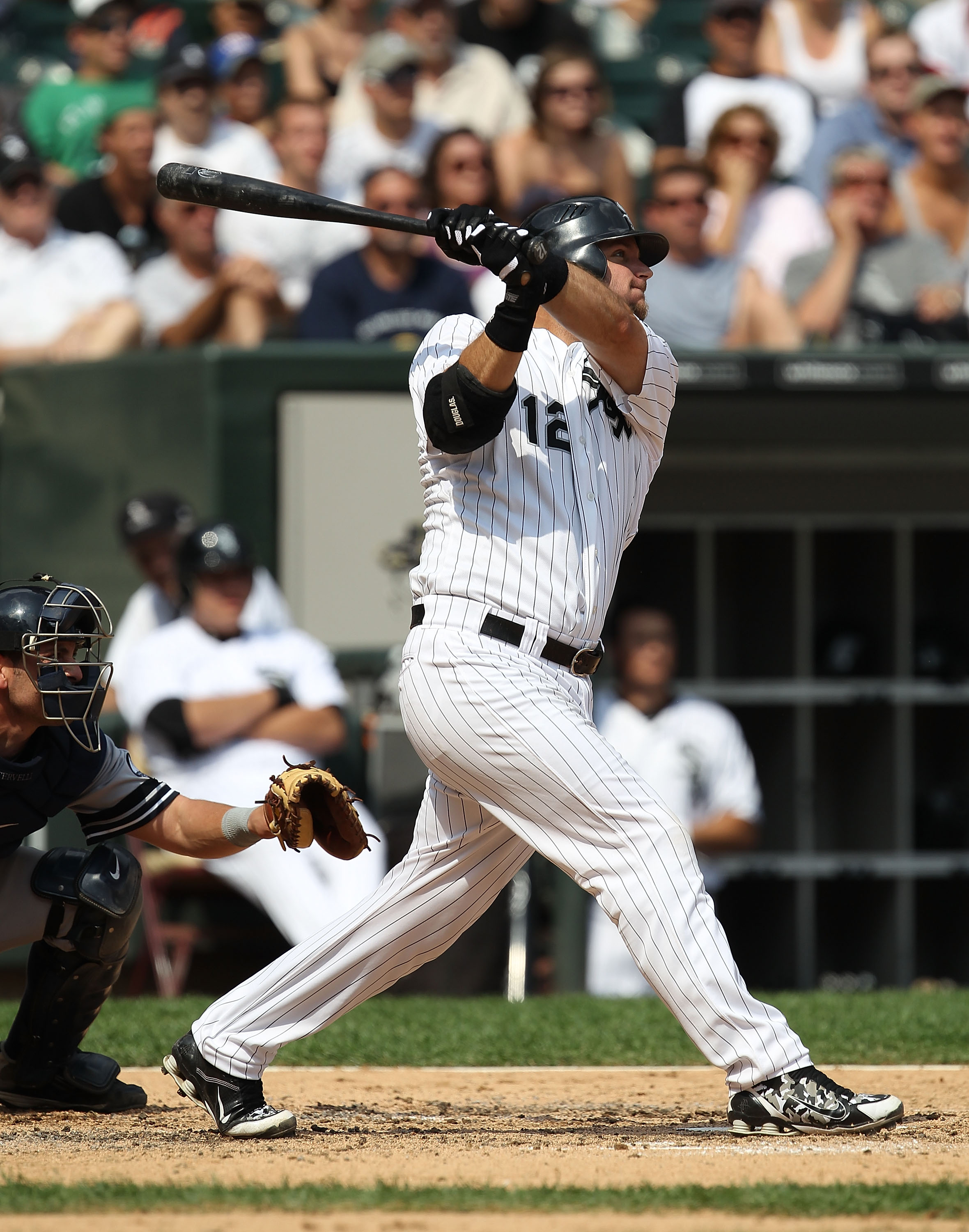 CHICAGO - AUGUST 29: A.J. Pierzynski #12 of the Chicago White Sox hits the ball against the New York Yankees at U.S. Cellular Field on August 29, 2010 in Chicago, Illinois. The Yankees defeated the White Sox 2-1. (Photo by Jonathan Daniel/Getty Images)