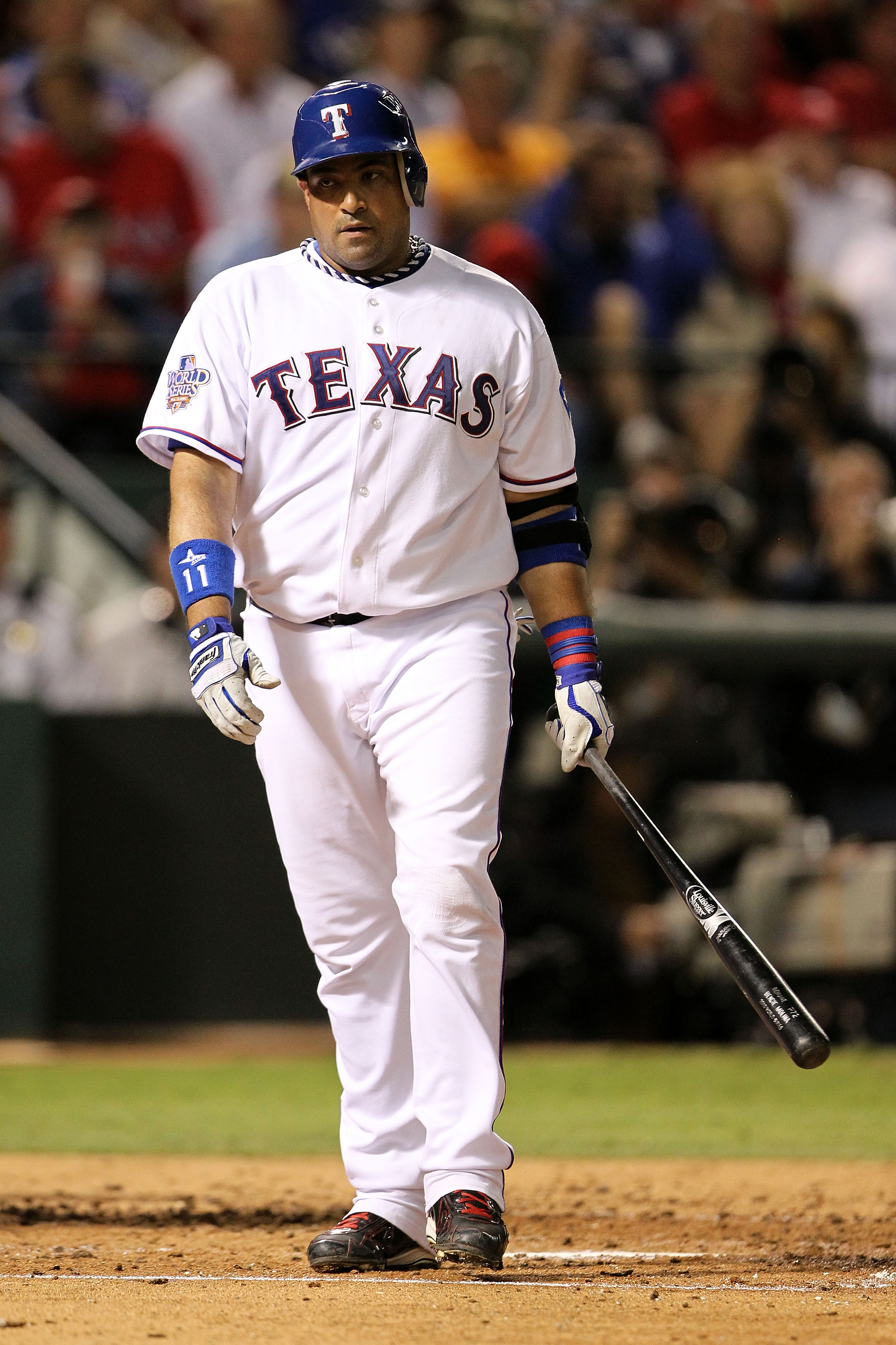 ARLINGTON, TX - NOVEMBER 01:  Bengie Molina #11 of the Texas Rangers reacts after he struck out against the San Francisco Giants in Game Five of the 2010 MLB World Series at Rangers Ballpark in Arlington on November 1, 2010 in Arlington, Texas. The Giants