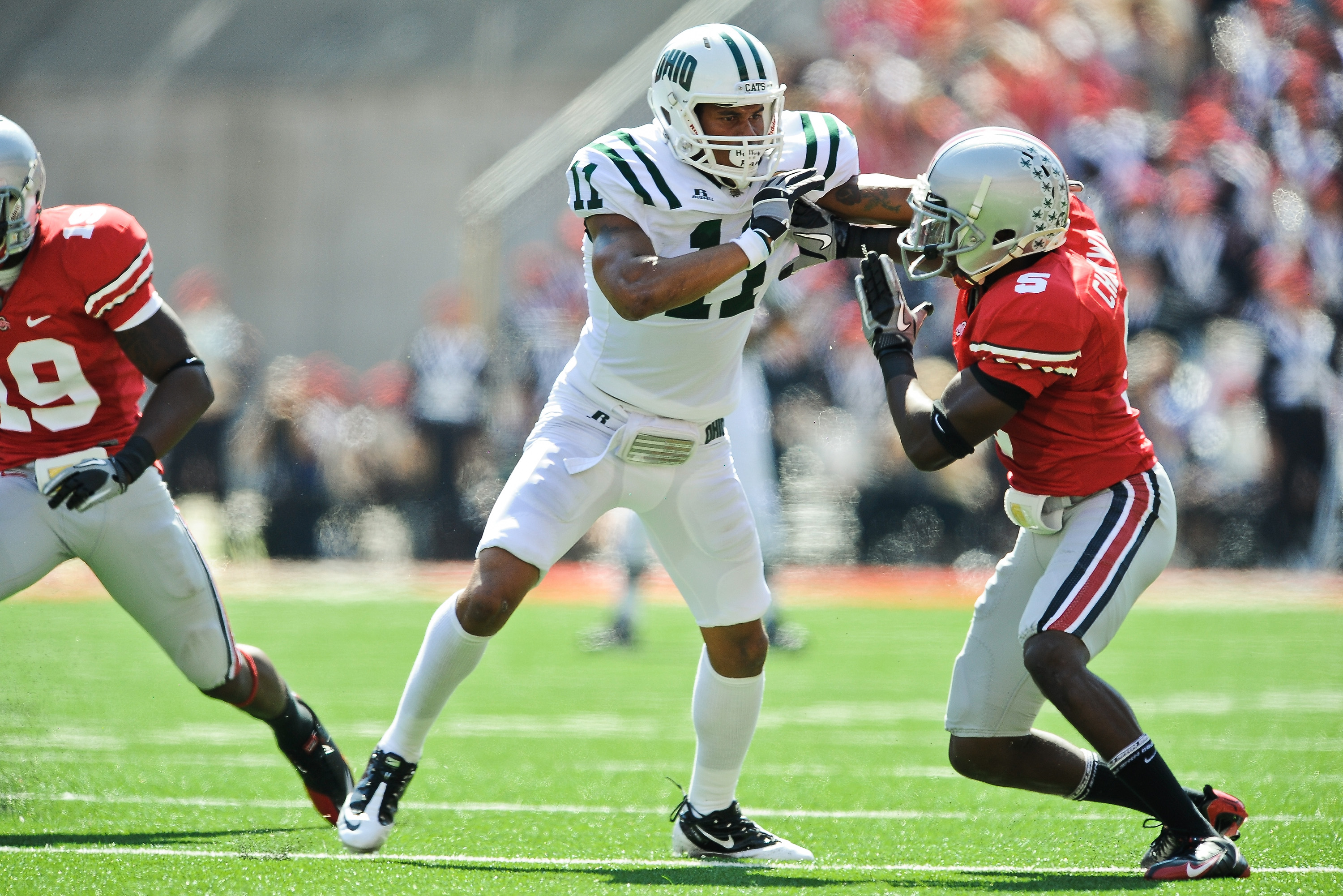 COLUMBUS, OH - SEPTEMBER 18: Terrence McCrae #11 of the Ohio Bobcats blocks Chimdi Chekwa #5 of the Ohio State Buckeyes at Ohio Stadium on September 18, 2010 in Columbus, Ohio. (Photo by Jamie Sabau/Getty Images)