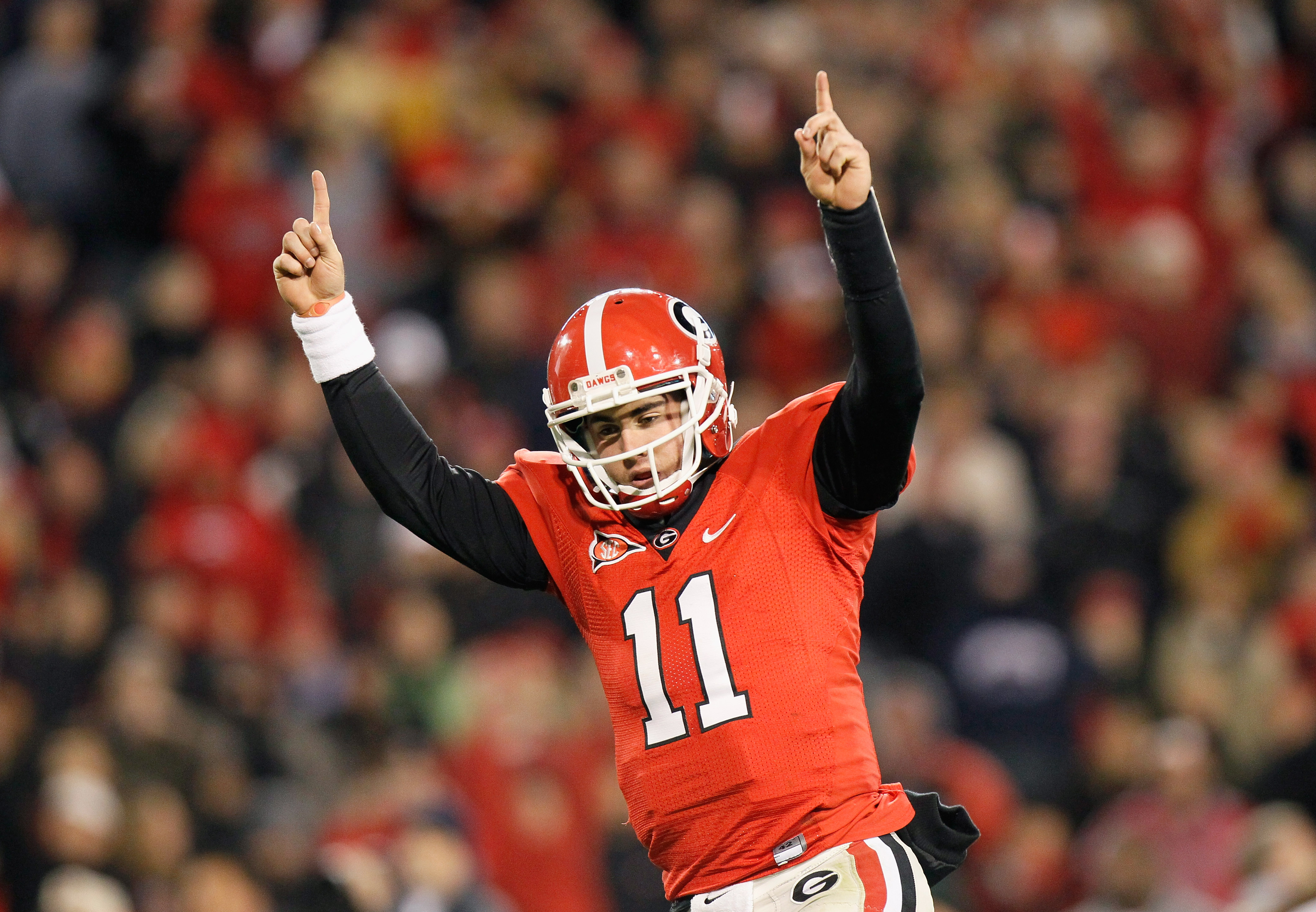 ATHENS, GA - NOVEMBER 27: Quarterback Aaron Murray #11 of the Georgia Bulldogs reacts after scoring a touchdown against the Georgia Tech Yellow Jackets at Sanford Stadium on November 27, 2010 in Athens, Georgia. (Photo by Kevin C. Cox/Getty Images)