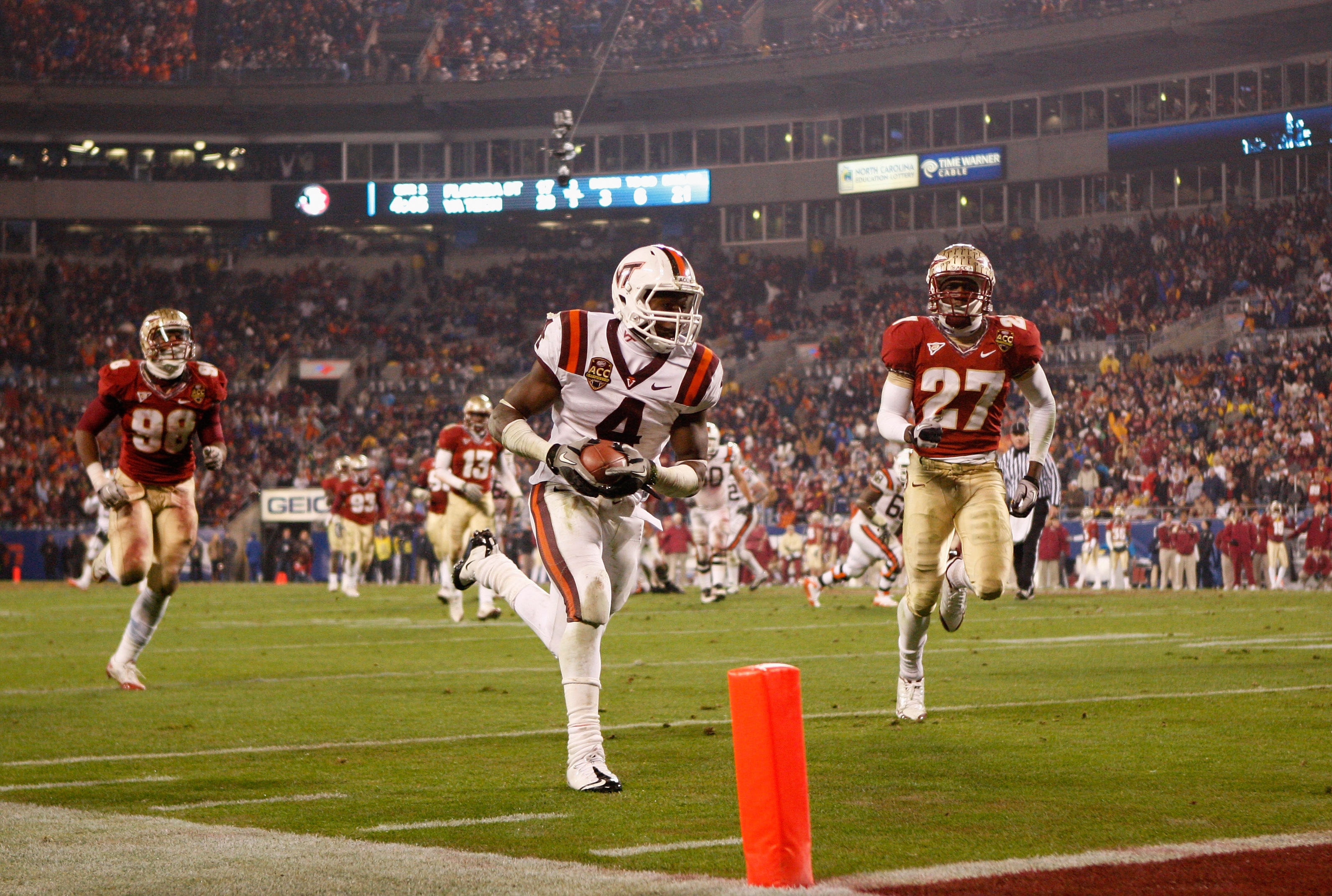 CHARLOTTE, NC - DECEMBER 04: David Wilson #4 of the Virginia Tech Hokies runs for a touchdown during their game against the Florida State Seminoles at Bank of America Stadium on December 4, 2010 in Charlotte, North Carolina. (Photo by Streeter Lecka/Get
