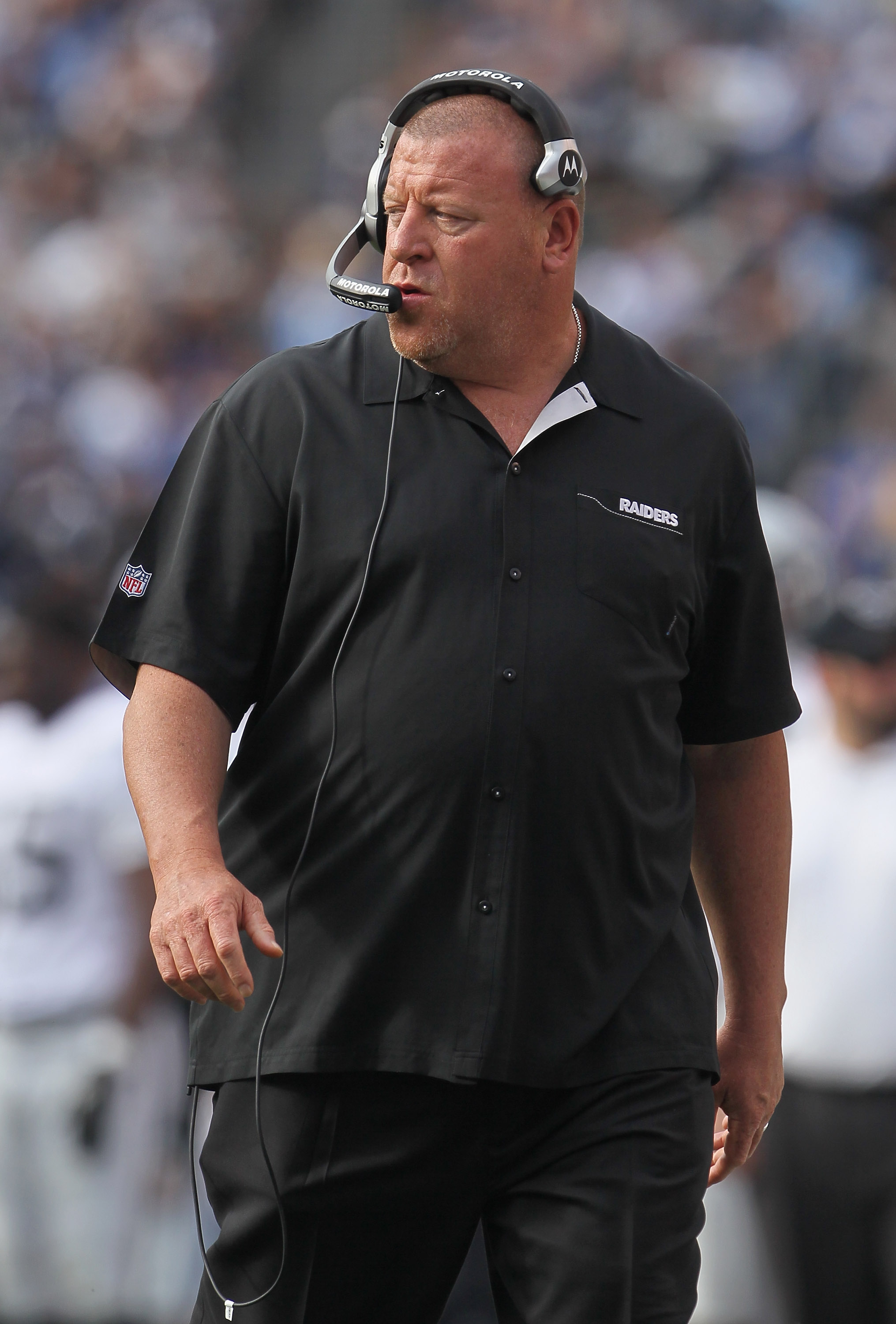 SAN DIEGO - DECEMBER 05:  Oakland Raiders head coach Tom Cable looks on from the sideline during the first half against the San Diego Chargers at Qualcomm Stadium on December 5, 2010 in San Diego, California. The Raiders defeated the Chargers 28-13.  (Pho