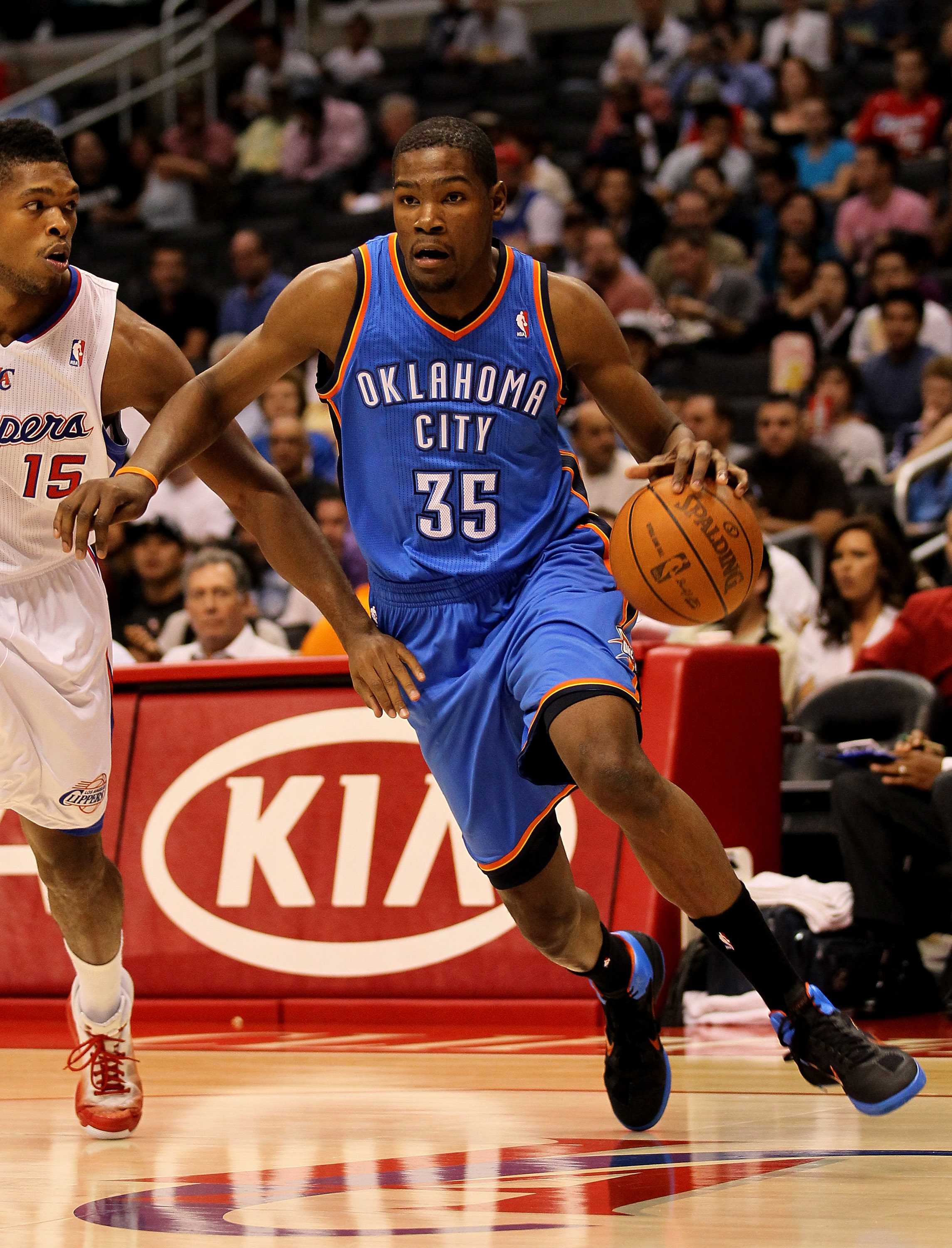 LOS ANGELES - NOVEMBER 3:  Kevin Durant #32 of the Oklahoma City Thunder drives past Ryan Gomes #15 of the Los Angeles Clippers at Staples Center on November 3, 2010 in Los Angeles, California.  NOTE TO USER: User expressly acknowledges and agrees that, b