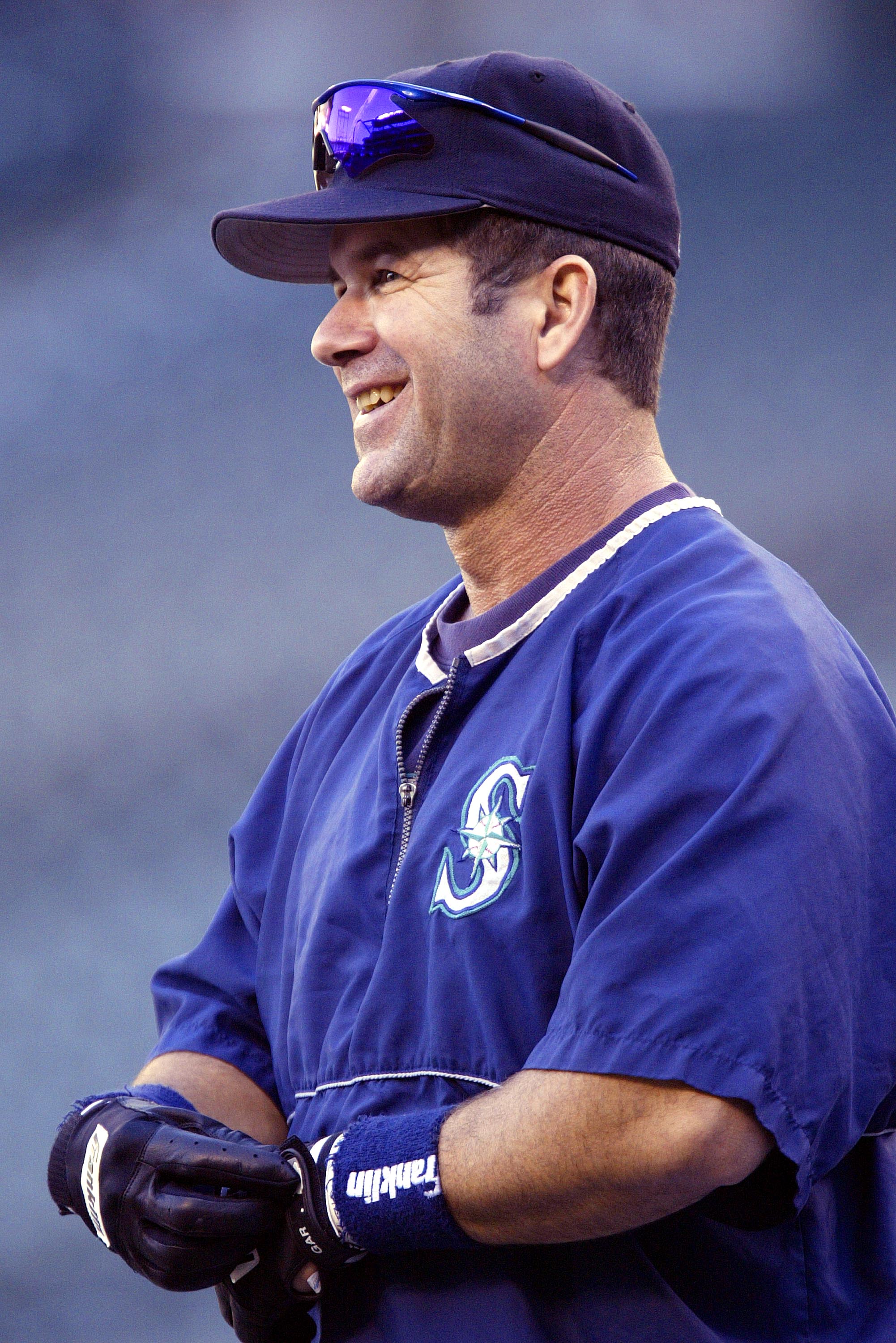 SEATTLE - OCTOBER 1:  Designated hitter Edgar Martinez #11 of the Seattle Mariners smiles during practice for the game against the Texas Rangers on October 1 2004 at Safeco Field in Seattle, Washington. Edgar Martinez plans to retire at the end of the sea