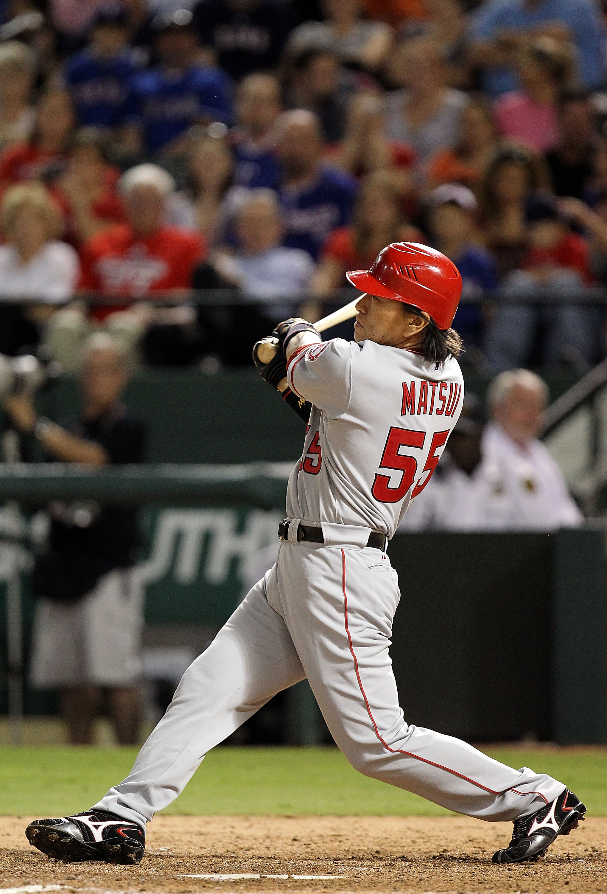 Los Angeles Angels designated hitter Hideki Matsui (55) greets New