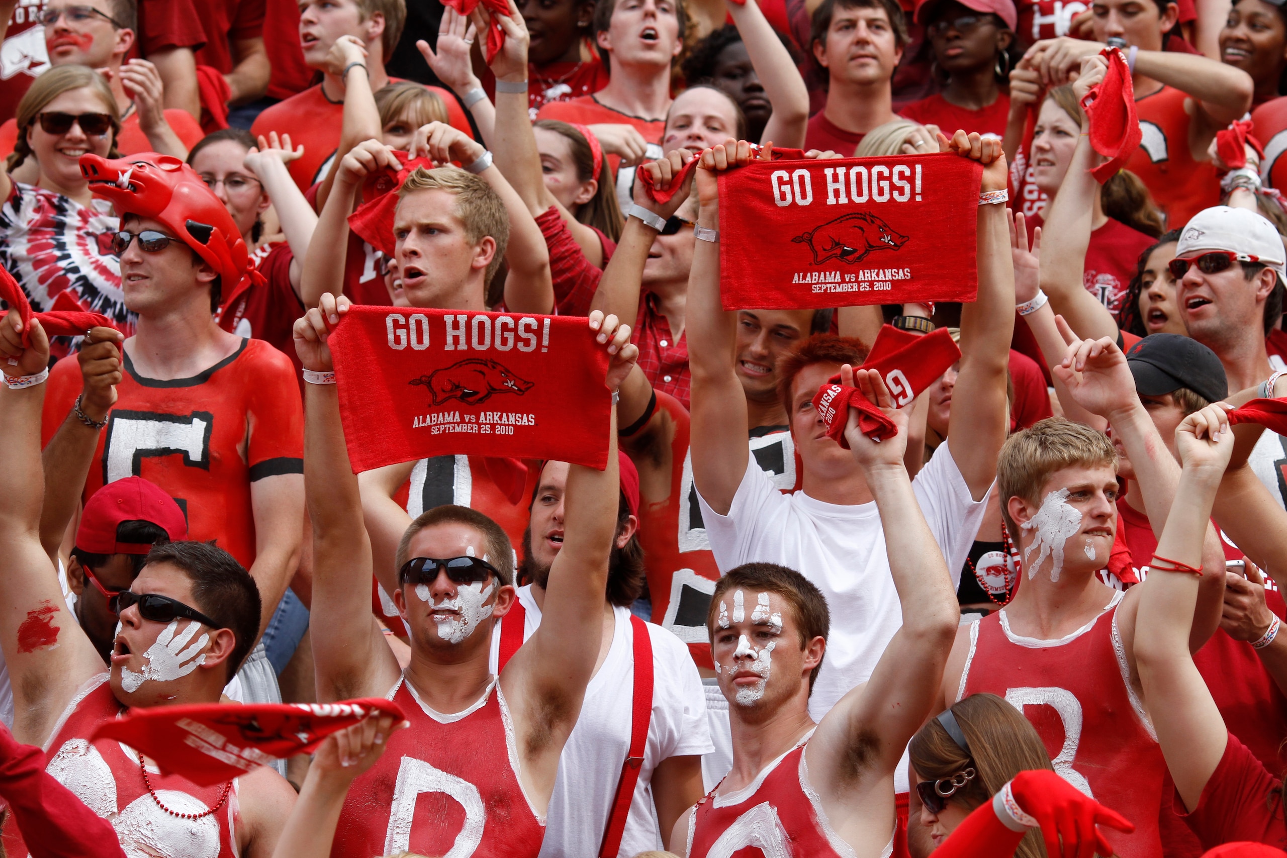 FAYETTEVILLE - SEPTEMBER 25: Arkansas Razorbacks fans cheer during the game against the Alabama Crimson Tide at Donald W. Reynolds Razorback Stadium on September 25, 2010 in Fayetteville, Arkansas. Alabama won 24-20. (Photo by Joe Robbins/Getty Images) FAYETTEVILLE - SEPTEMBER 25: Arkansas Razorbacks fans cheer during the game against the Alabama Crimson Tide at Donald W. Reynolds Razorback Stadium on September 25, 2010 in Fayetteville, Arkansas. Alabama won 24-20. (Photo by Joe Robbins/Getty Images)