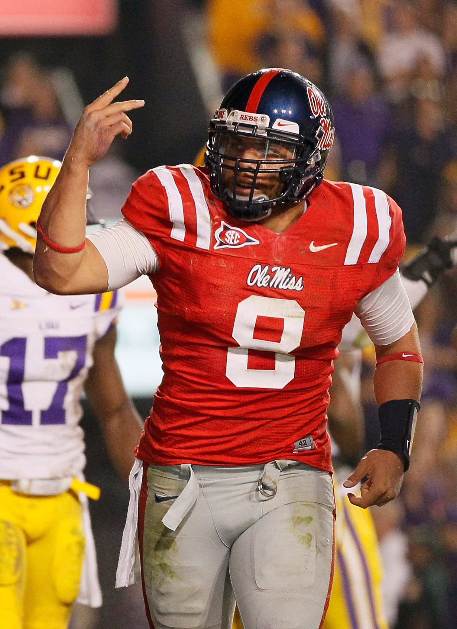 BATON ROUGE, LA - NOVEMBER 20:  Quarterback Jeremiah Masoli #8 of the Ole Miss Rebels reacts after scoring his second touchdown against the Louisiana State University Tigers at Tiger Stadium on November 20, 2010 in Baton Rouge, Louisiana.  (Photo by Kevin