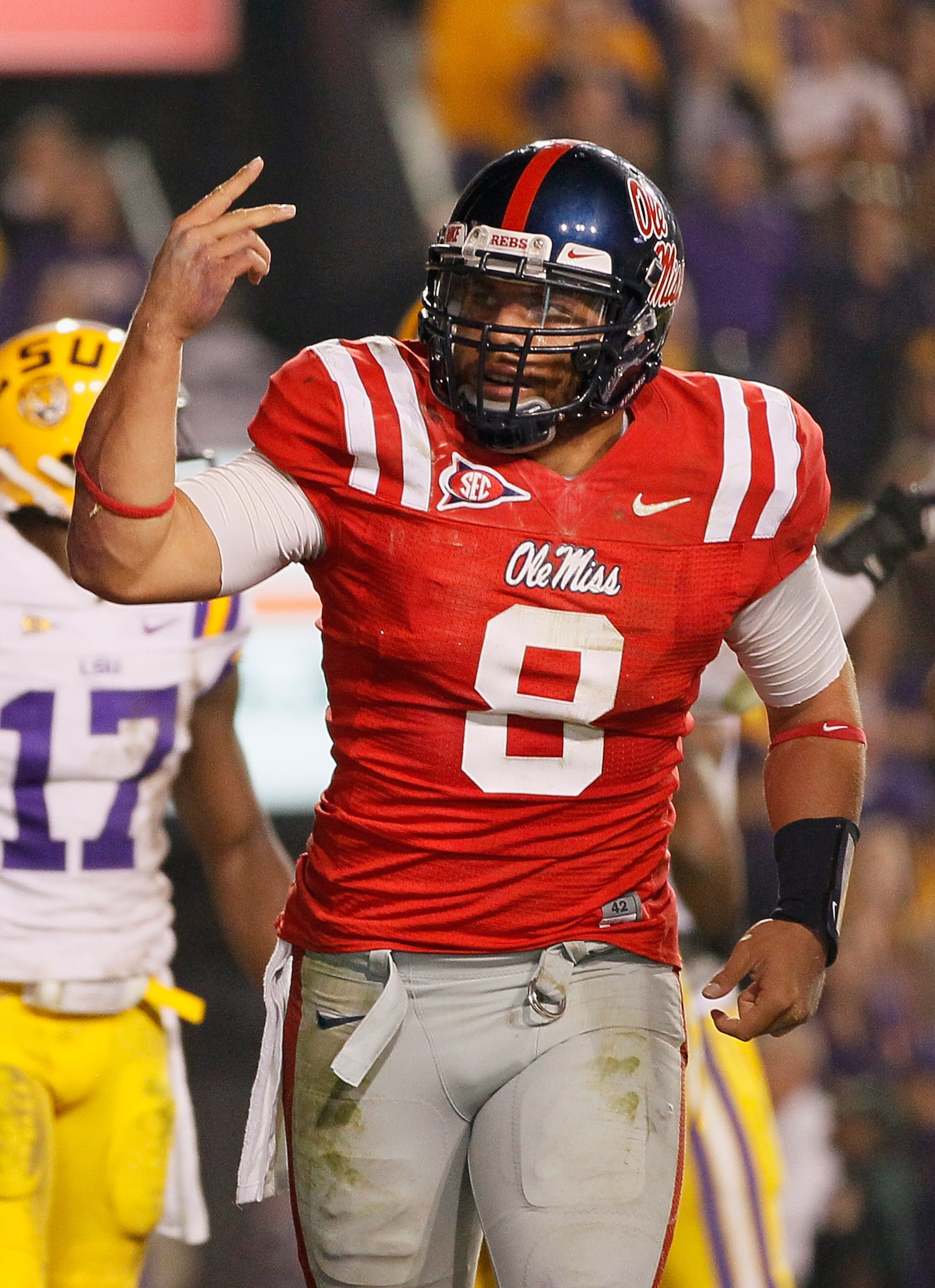 BATON ROUGE, LA - NOVEMBER 20: Quarterback Jeremiah Masoli #8 of the Ole Miss Rebels reacts after scoring his second touchdown against the Louisiana State University Tigers at Tiger Stadium on November 20, 2010 in Baton Rouge, Louisiana. (Photo by Kevin BATON ROUGE, LA - NOVEMBER 20: Quarterback Jeremiah Masoli #8 of the Ole Miss Rebels reacts after scoring his second touchdown against the Louisiana State University Tigers at Tiger Stadium on November 20, 2010 in Baton Rouge, Louisiana. (Photo by Kevin