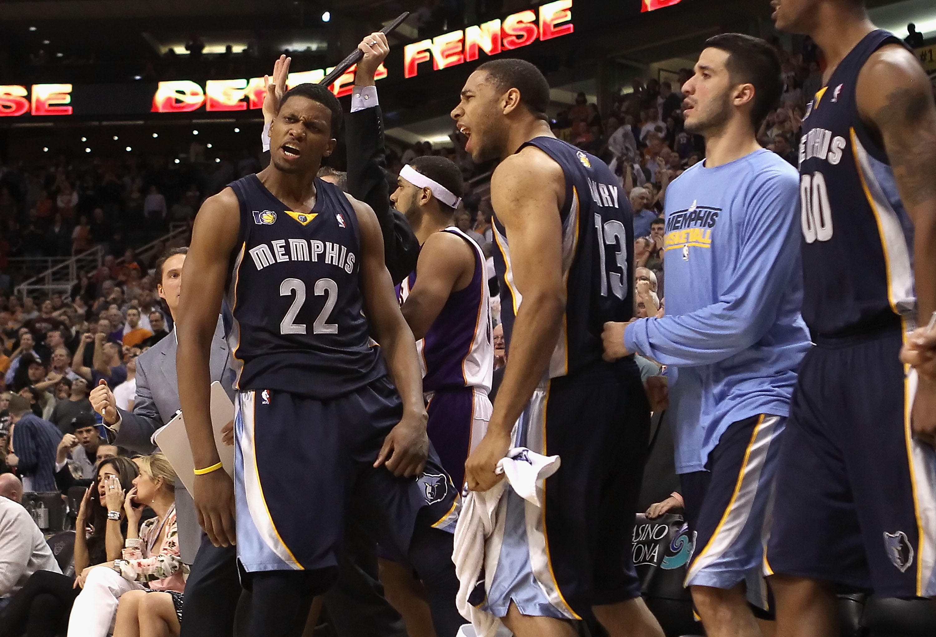 PHOENIX - DECEMBER 08:  Rudy Gay #22 of the Memphis Grizzlies reacts with Xavier Henry #13 after Gay hit the game tying three point shot against the Phoenix Suns at the end of regulation in the NBA game at US Airways Center on December 8, 2010 in Phoenix,