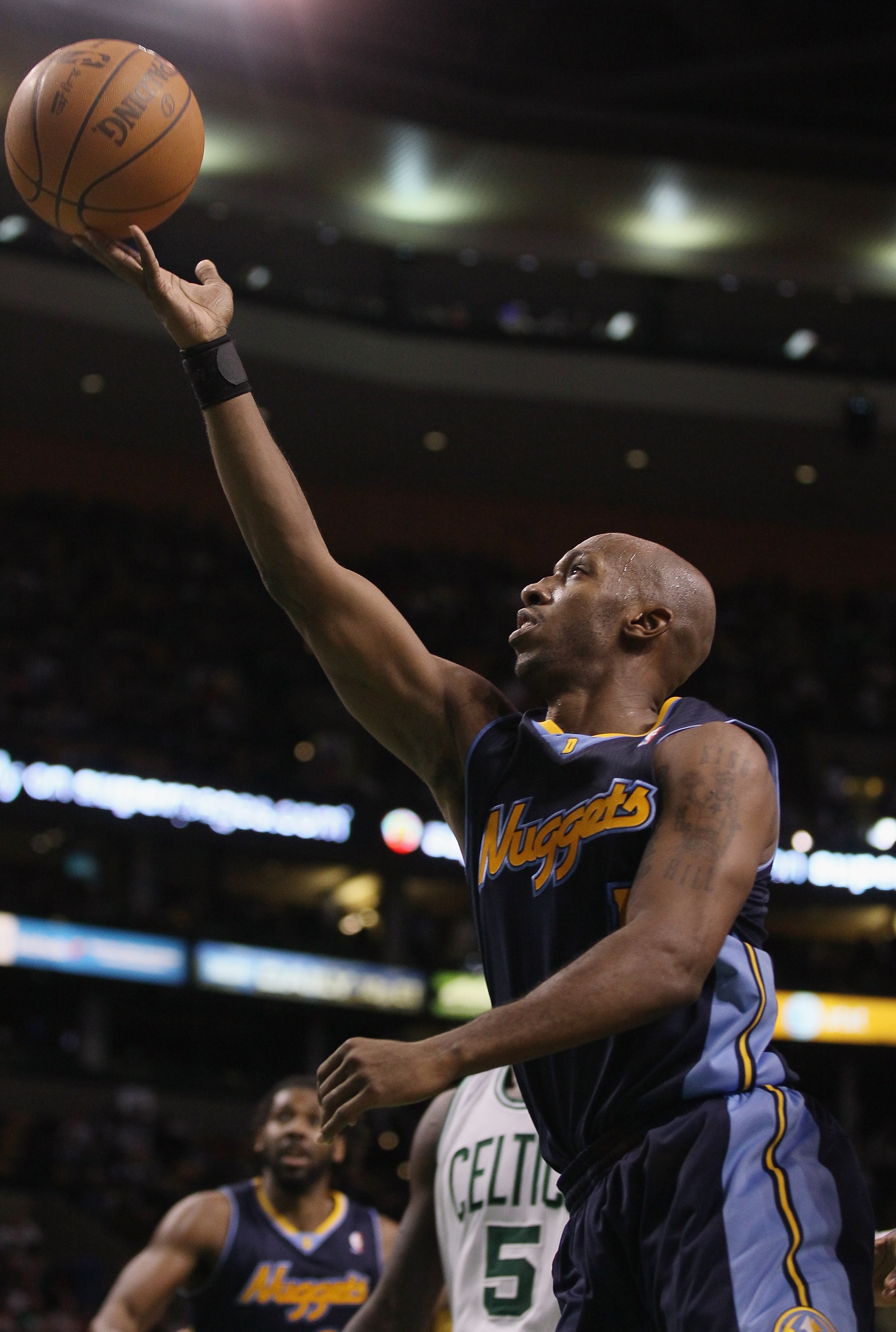 BOSTON, MA - DECEMBER 08: Chauncey Billups #1 of the Denver Nuggets heads for the basket in the second half against the Boston Celtics on December 8, 2010 at the TD Garden in Boston, Massachusetts. The Celtics defeated the Nuggets 105-89. NOTE TO USER: U