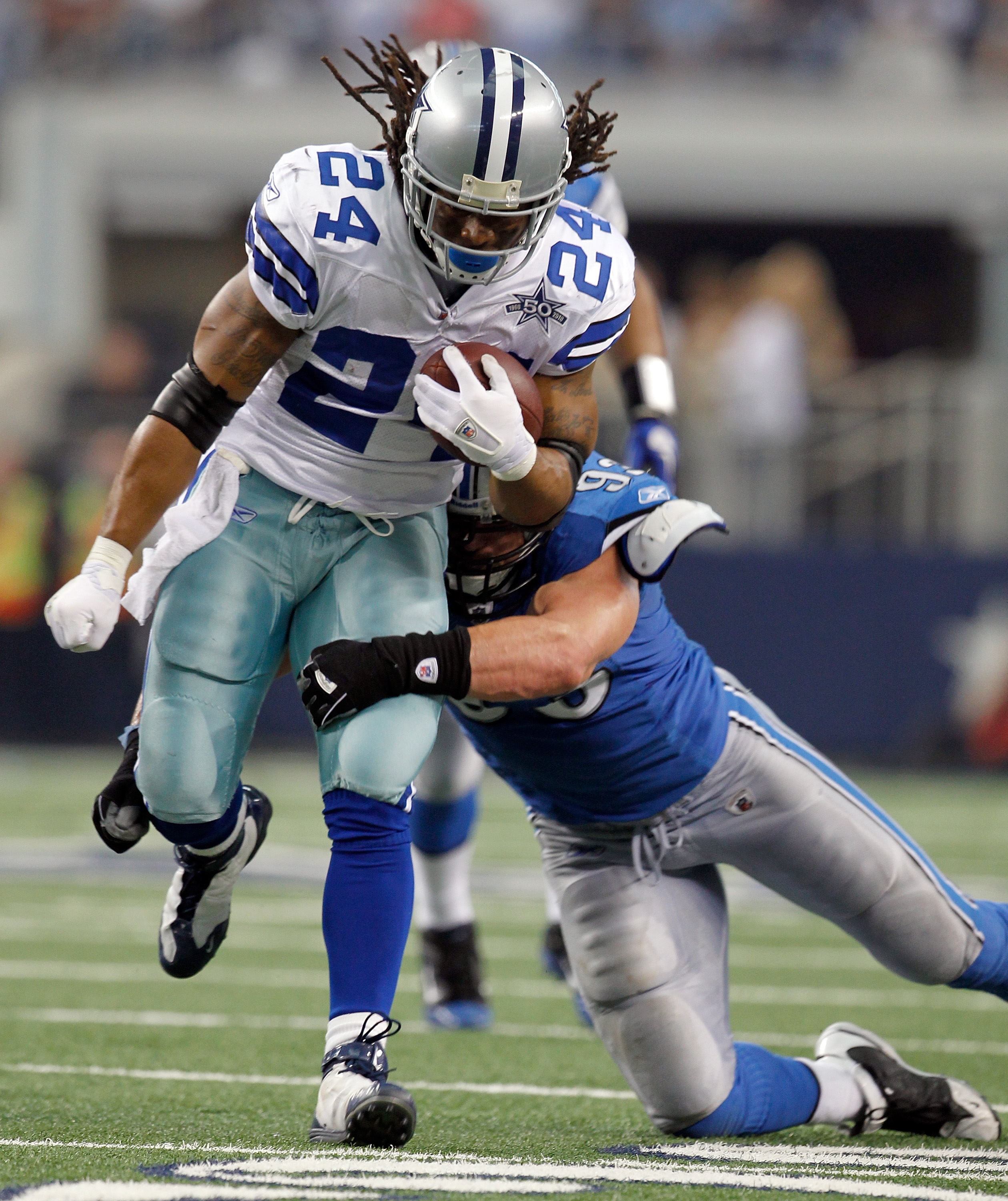 Dallas Cowboys running back Marion Barber (24) celebrates gaining