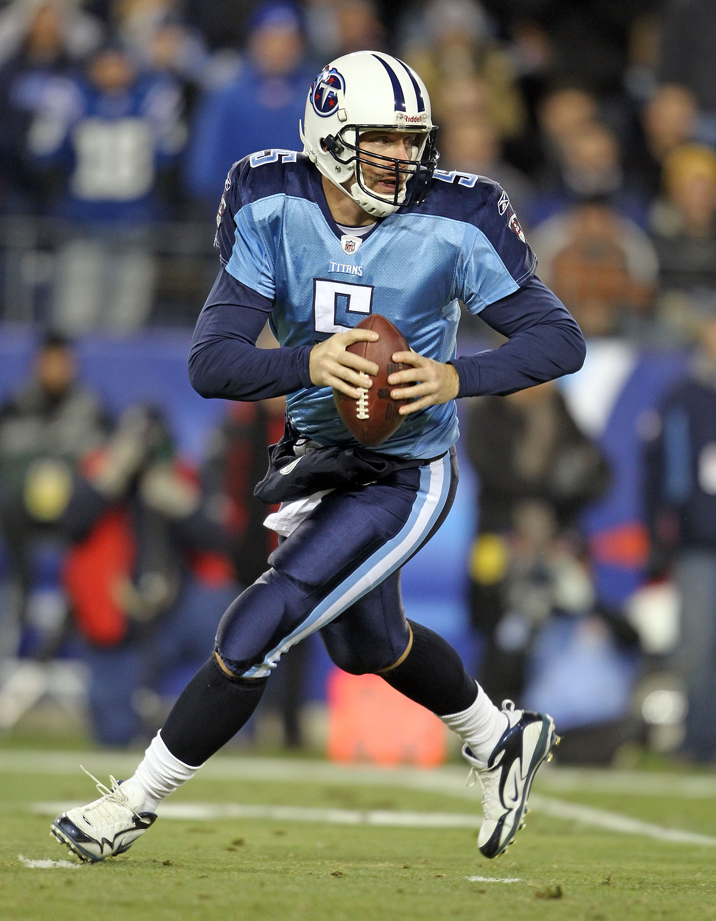 Nate Washington of the Tennessee Titans is tackled by Reggie