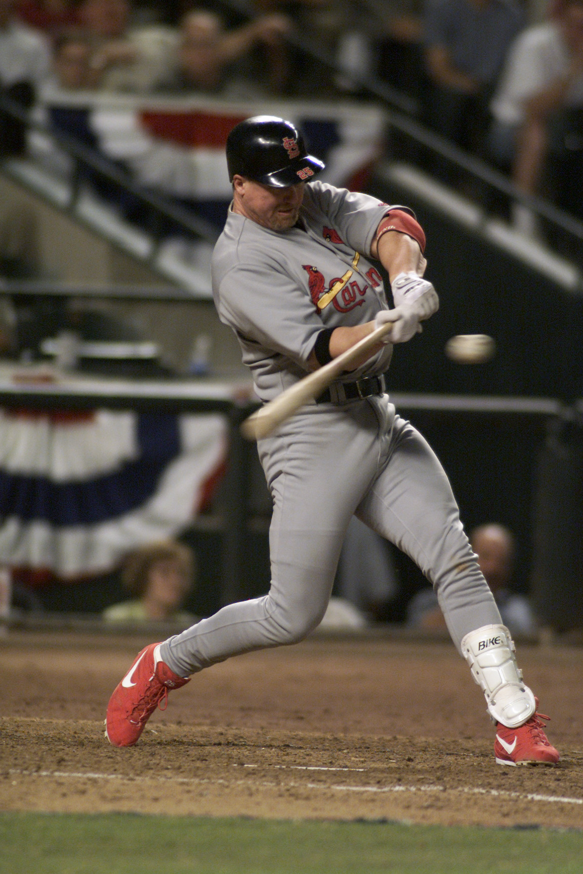 9 Oct 2001:  Mark McGwire #25 of the St. Louis Cardinals swings at a pitch during game one of the National League West Divisional Series against the Arizona Diamondbacks at Bank One Ballpark in Phoenix, Arizona. The Diamondbacks win 1-0 over the Cardinals