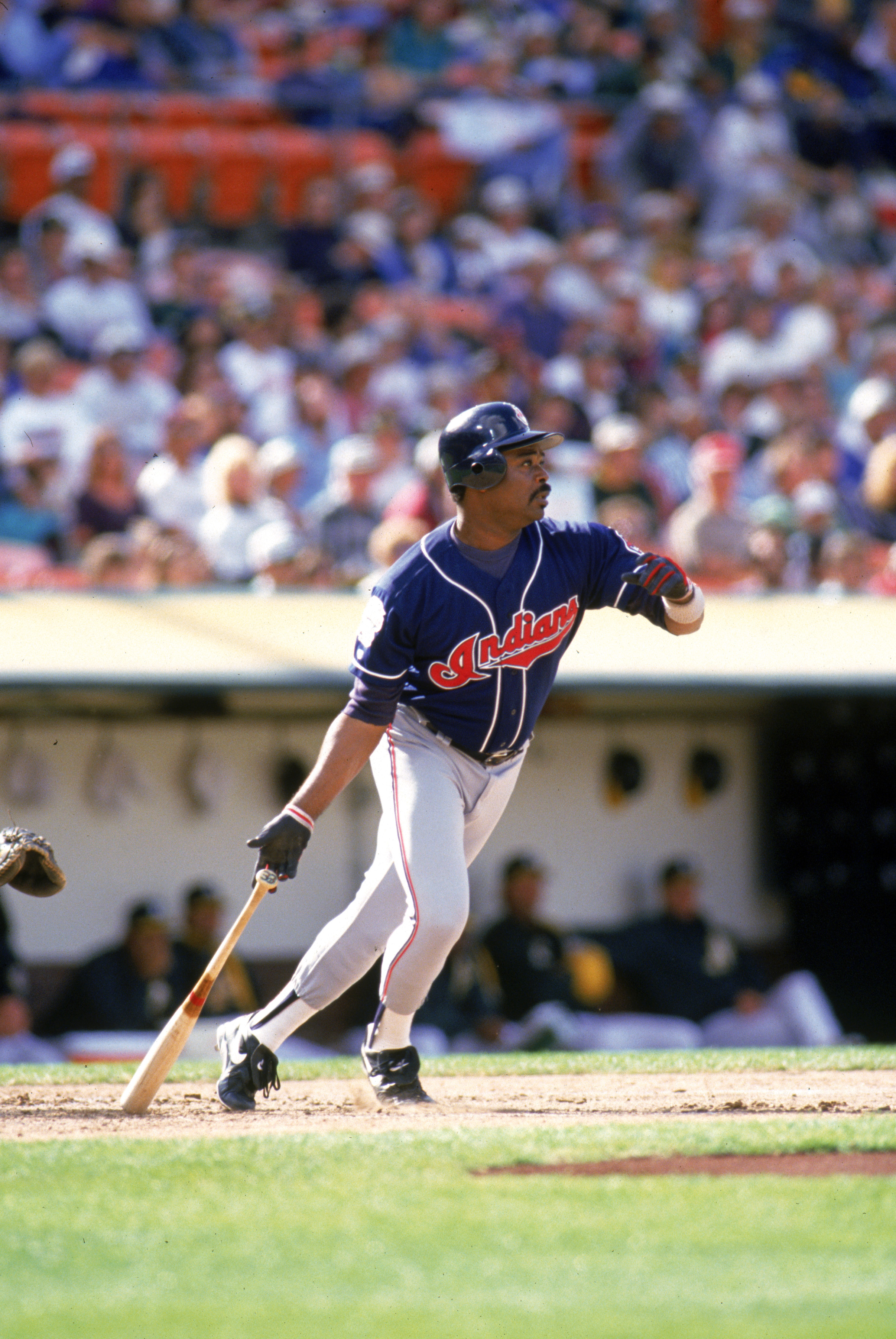 CITYSTATE - JUNE 5:  Eddie Murray #33 of the Cleveland Indians watches the flight of his hit during a game against the Oakland Athletics at Oakland Alameda County Stadium on June 5, 1994 in Oakland, California. (Photo by Otto Greule Jr/Getty Images)