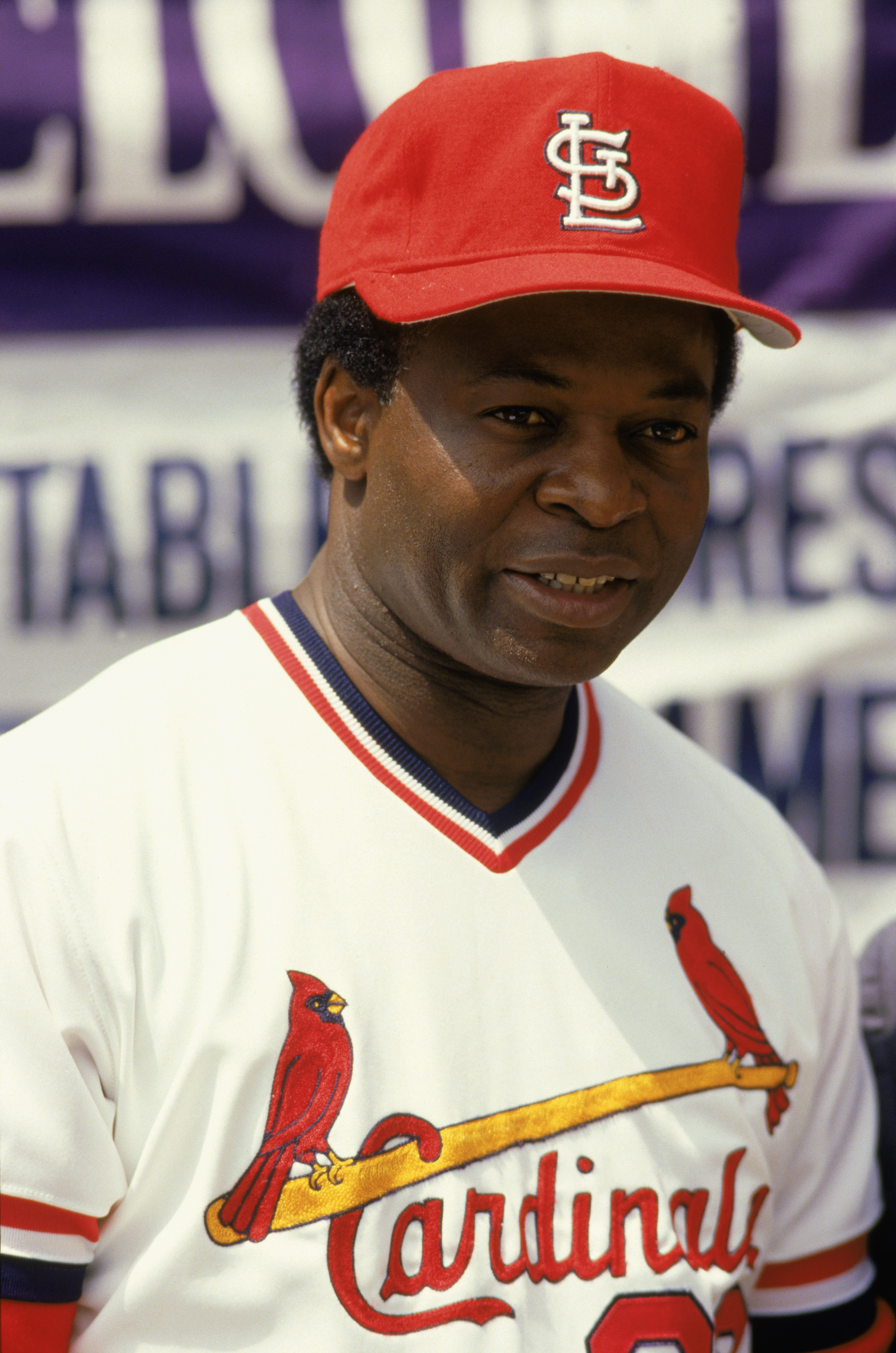 1986:  Former St. Louis Cardinal player Lou Brock '64-'79,  looks on in a game during the 1986 season. (Photo by: Stephen Dunn/Getty Images)