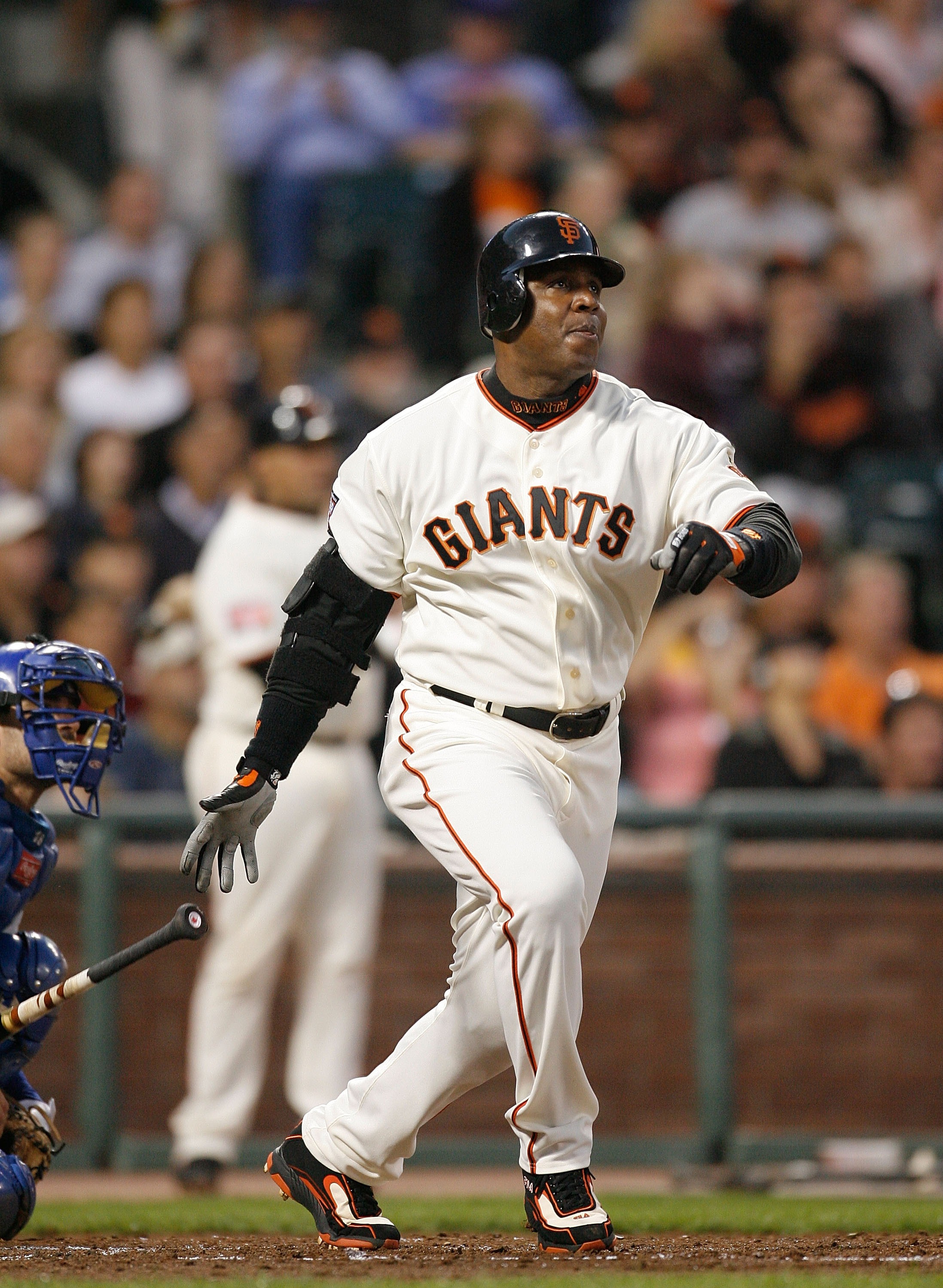 SAN FRANCISCO - AUGUST 22:  Outfielder Barry Bonds #25 of the San Francisco Giants watches his ball hit off the right field wall for a double during a Major League Baseball game against the Chicago Cubs on August 22, 2007 at AT&T Park in San Francisco, Ca