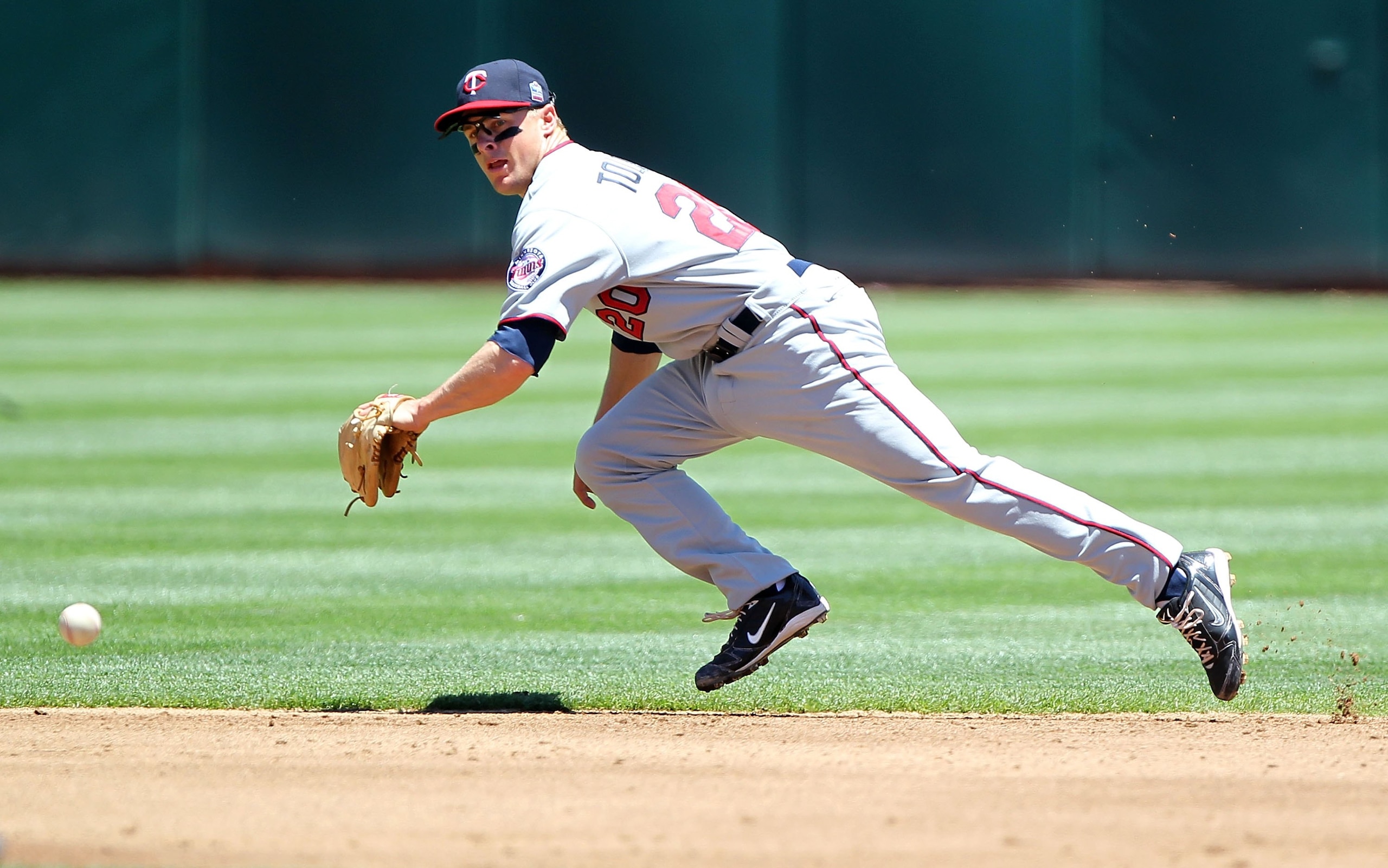 OAKLAND, CA - JUNE 06:  Matt Tolbert #20 of the Minnesota Twins in action against the Oakland Athletics during an MLB game at the Oakland-Alameda County Coliseum on June 6, 2010 in Oakland, California.  (Photo by Jed Jacobsohn/Getty Images)