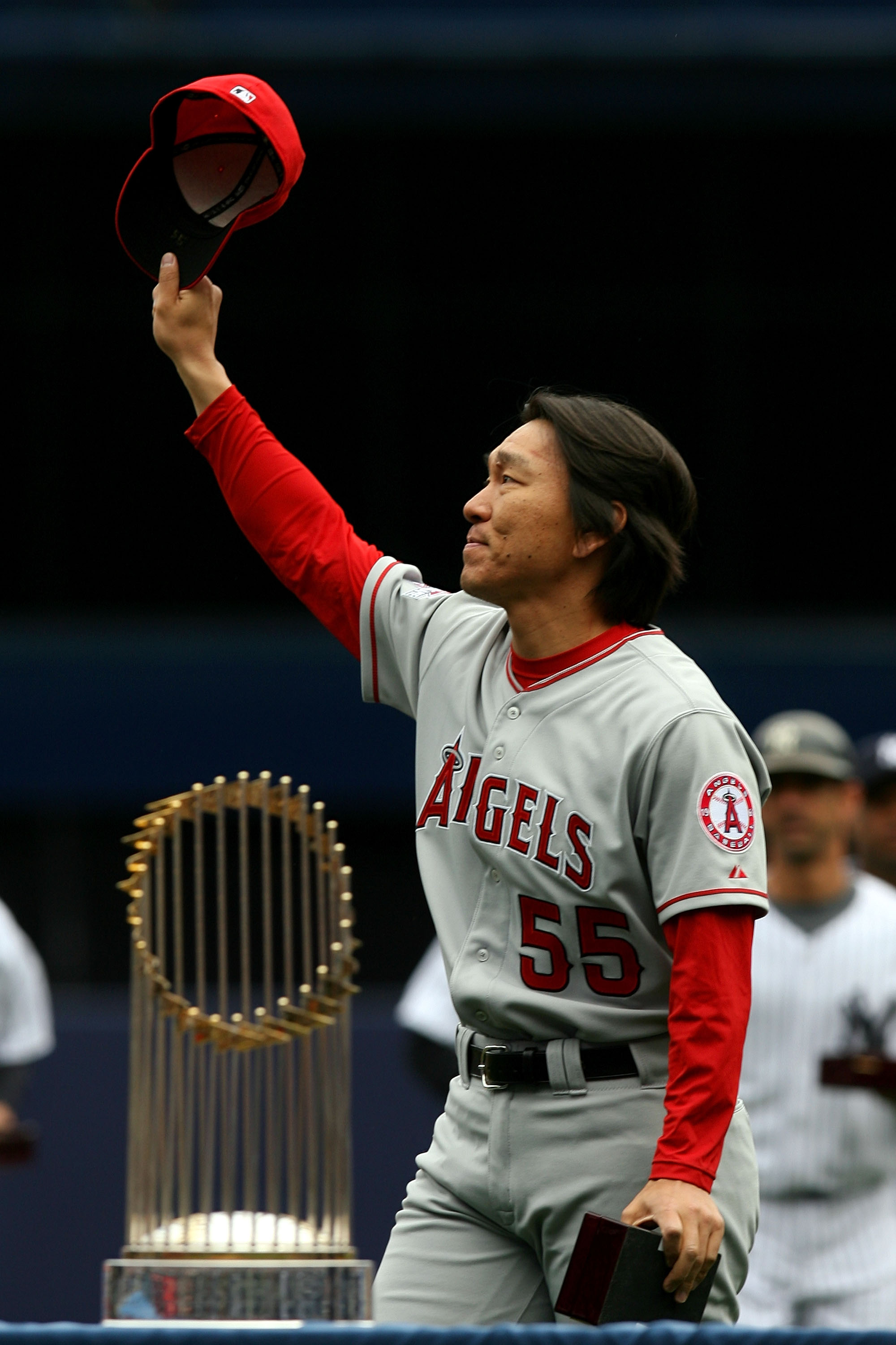 NEW YORK - APRIL 13:  Hideki Matsui #55 of the Los Angeles Angels of Anaheim acknowledges the fans after he received his World Series ring for being a member of the 2009 New York Yankees Worlder Series Championship team prior to playing against the New Yo