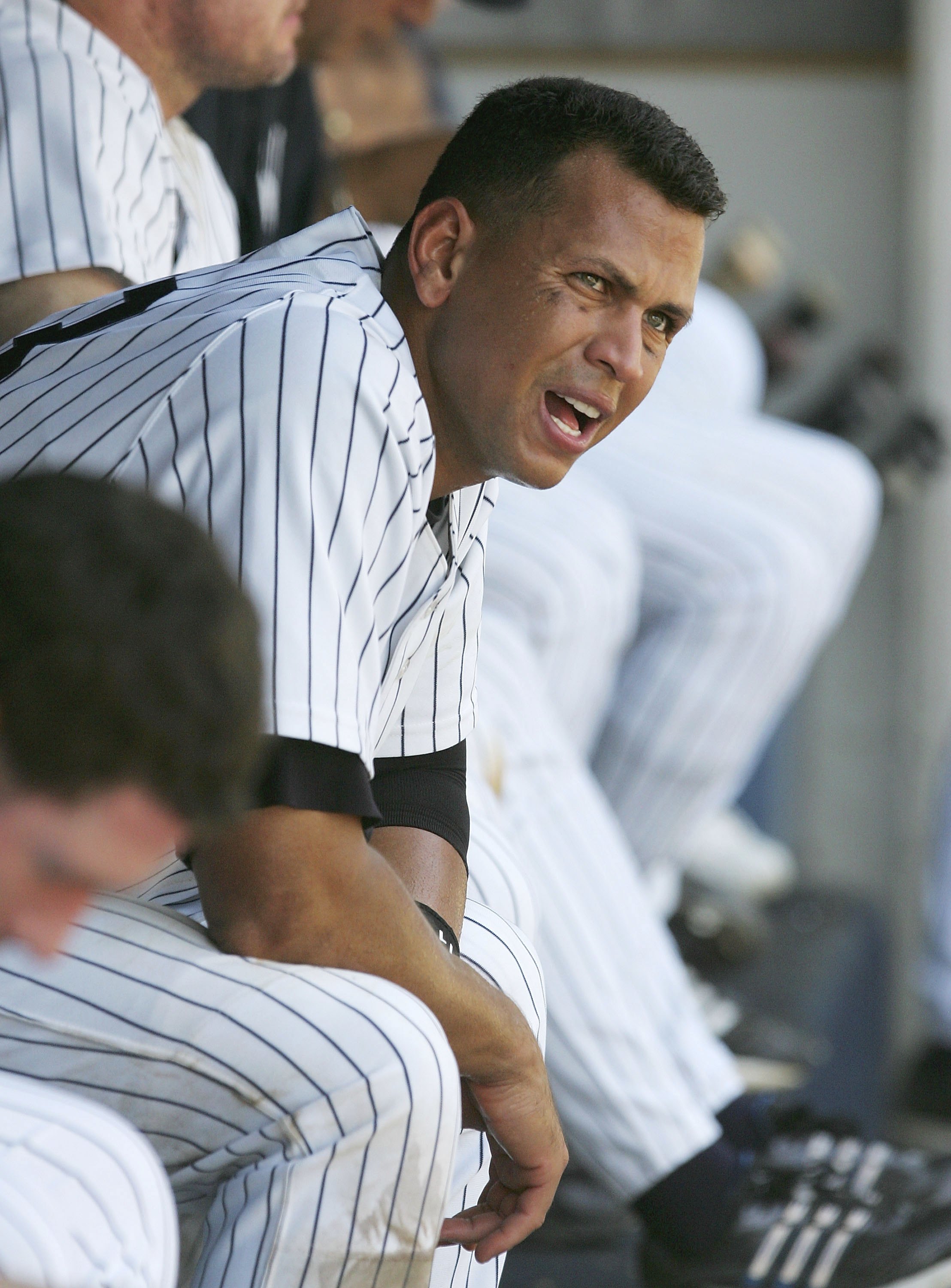 NEW YORK - JULY 19:  Alex Rodriguez #13 of the New York Yankees looks on from the dugout during the game against the Seattle Mariners at Yankee Stadium July 19, 2006 in the Bronx borough of New York City. The Mariners defeated the Yankees 3-2.  (Photo by