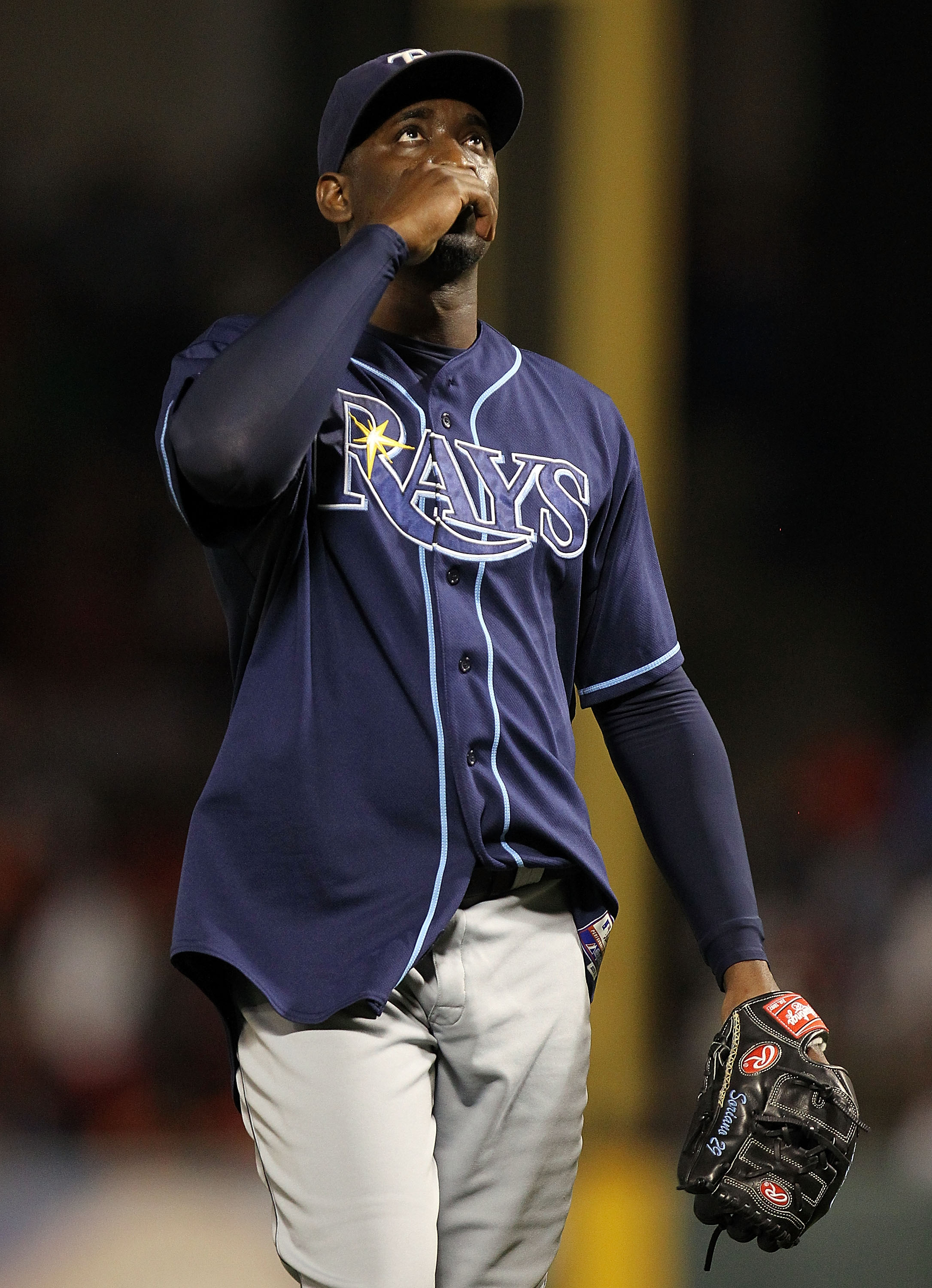 ARLINGTON, TX - OCTOBER 09:  Pitcher Rafael Soriano #29 of the Tampa Bay Rays reacts after a 6-3 win against the Texas Rangers during game 3 of the ALDS at Rangers Ballpark in Arlington on October 9, 2010 in Arlington, Texas.  (Photo by Ronald Martinez/Ge