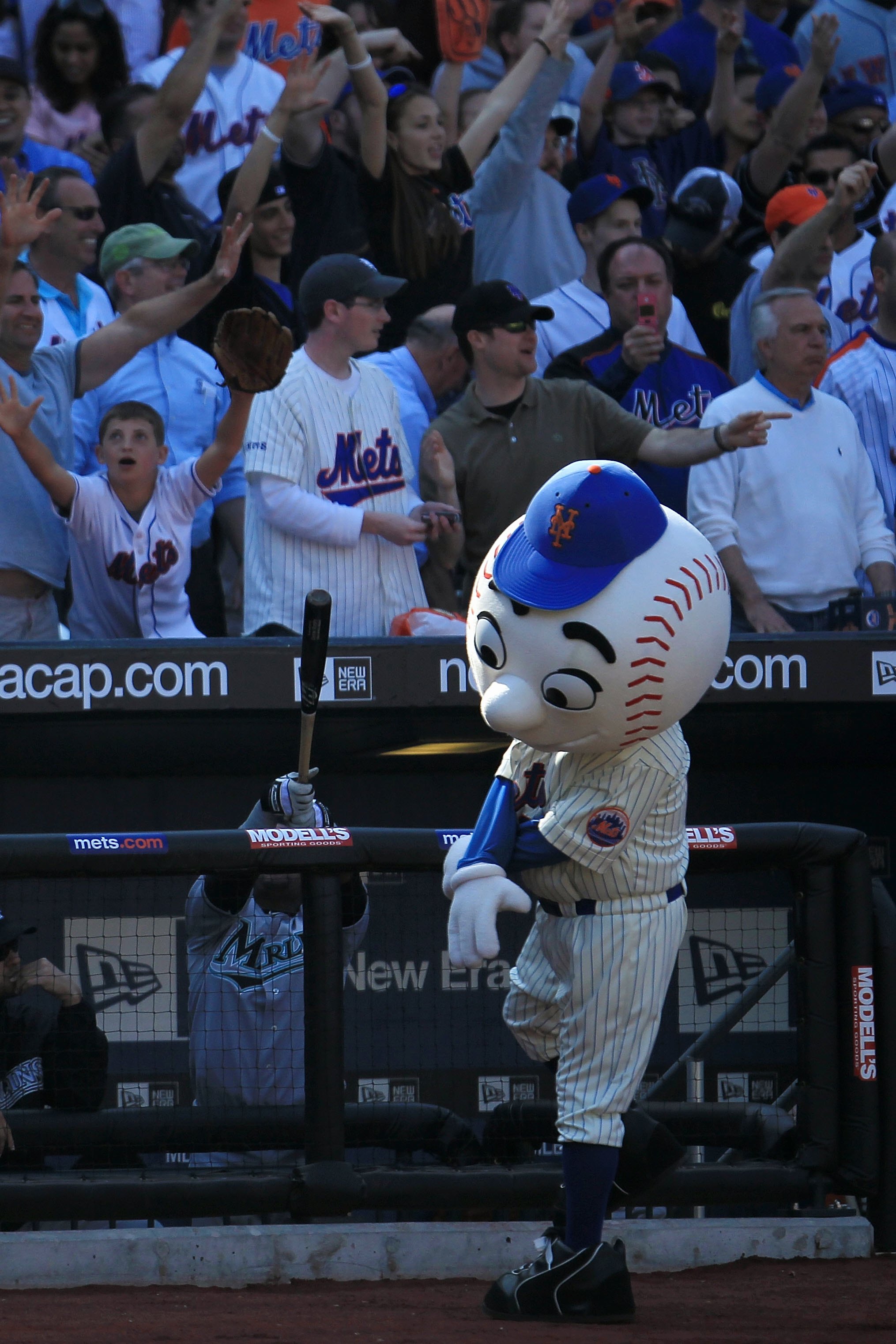 NEW YORK - APRIL 05: Mr. Met interacts with the crowd in the game between the Florida Marlins and the New York Mets during their Opening Day game at Citi Field on April 5, 2010 in the Flushing neighbourhood of the Queens borough of New York City.  (Photo 