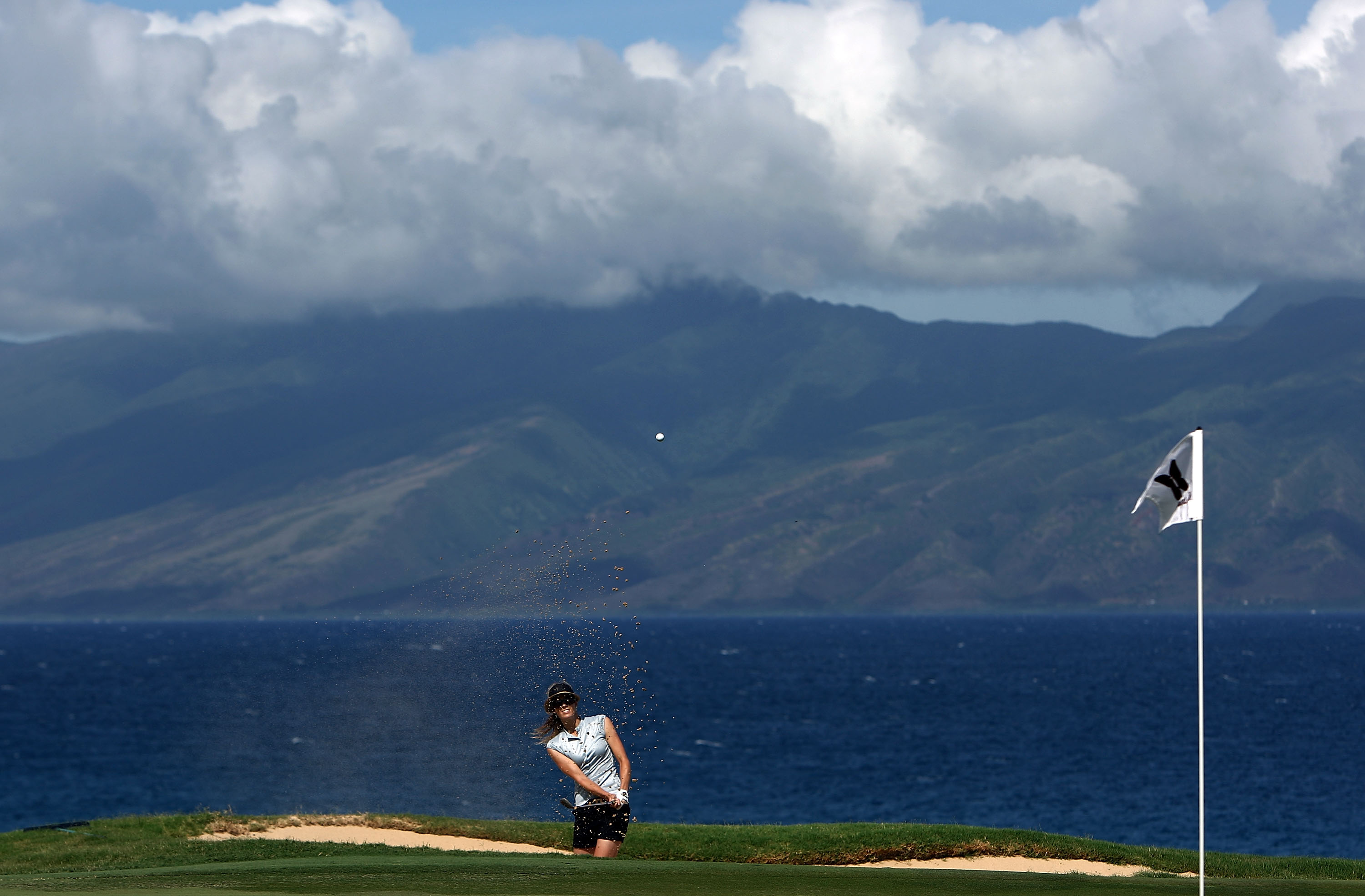 KAPALUA, HI - OCTOBER 16: Anna Rawson of Australia hits out of the green bunker on the 5th hole during the first round of the Kapalua LPGA Classic on October 16, 2008 at the Bay Course in Kapalua, Maui, Hawaii. (Photo by Donald Miralle/Getty Images)