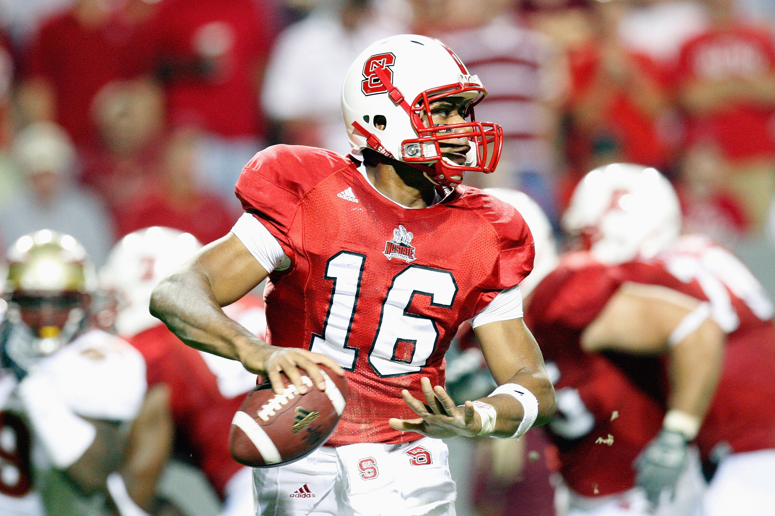 RALEIGH, NC - OCTOBER 16: Russell Wilson #16 of the North Carolina State Wolfpack looks for a receiver during the game against the Florida State Seminoles at Carter-Finley Stadium on October 16, 2008 in Raleigh, North Carolina. (Photo by Kevin C. Cox/Ge