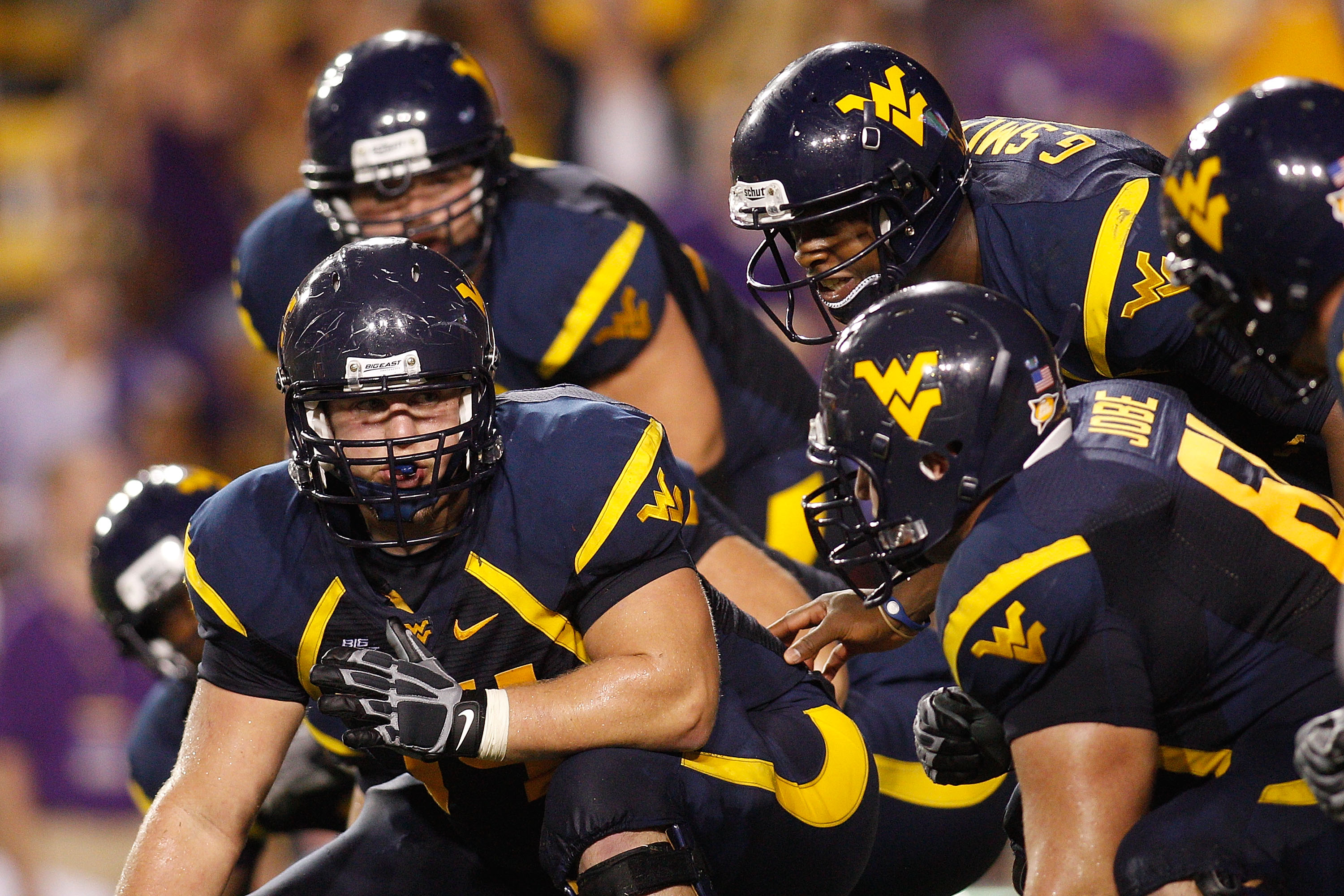 BATON ROUGE, LA - SEPTEMBER 25: Quarterback Geno Smith #12 of the West Virginia Mountaineers in action against the Louisiana State University Tigers at Tiger Stadium on September 25, 2010 in Baton Rouge, Louisiana. (Photo by Chris Graythen/Getty Images)