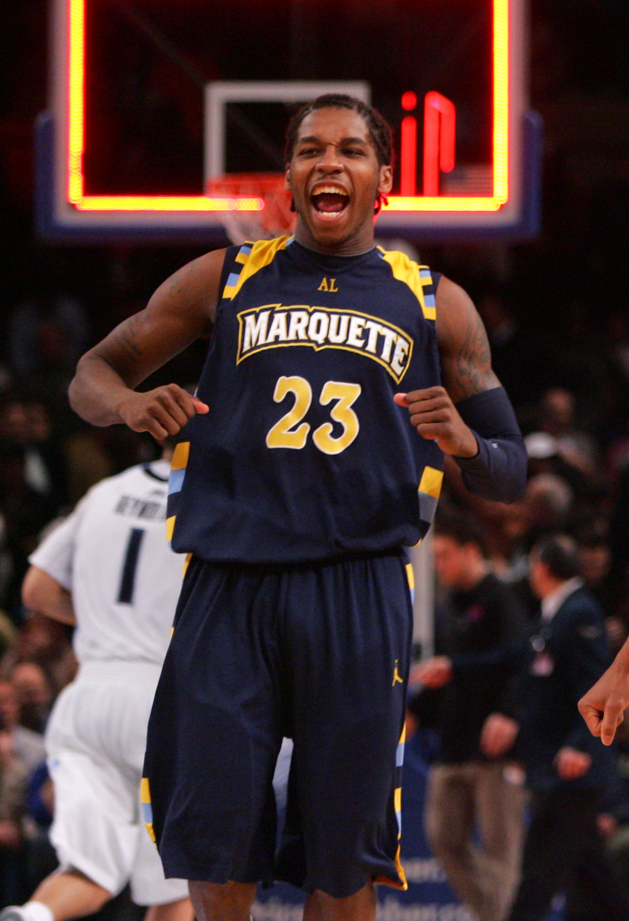 NEW YORK - MARCH 11: Dwight Buycks #23 of the Marquette Golden Eagles celebrates after defeating the Villanova Wildcats during the quarterfinal of the 2010 NCAA Big East Tournament at Madison Square Garden on March 11, 2010 in New York City.  (Photo by Ch