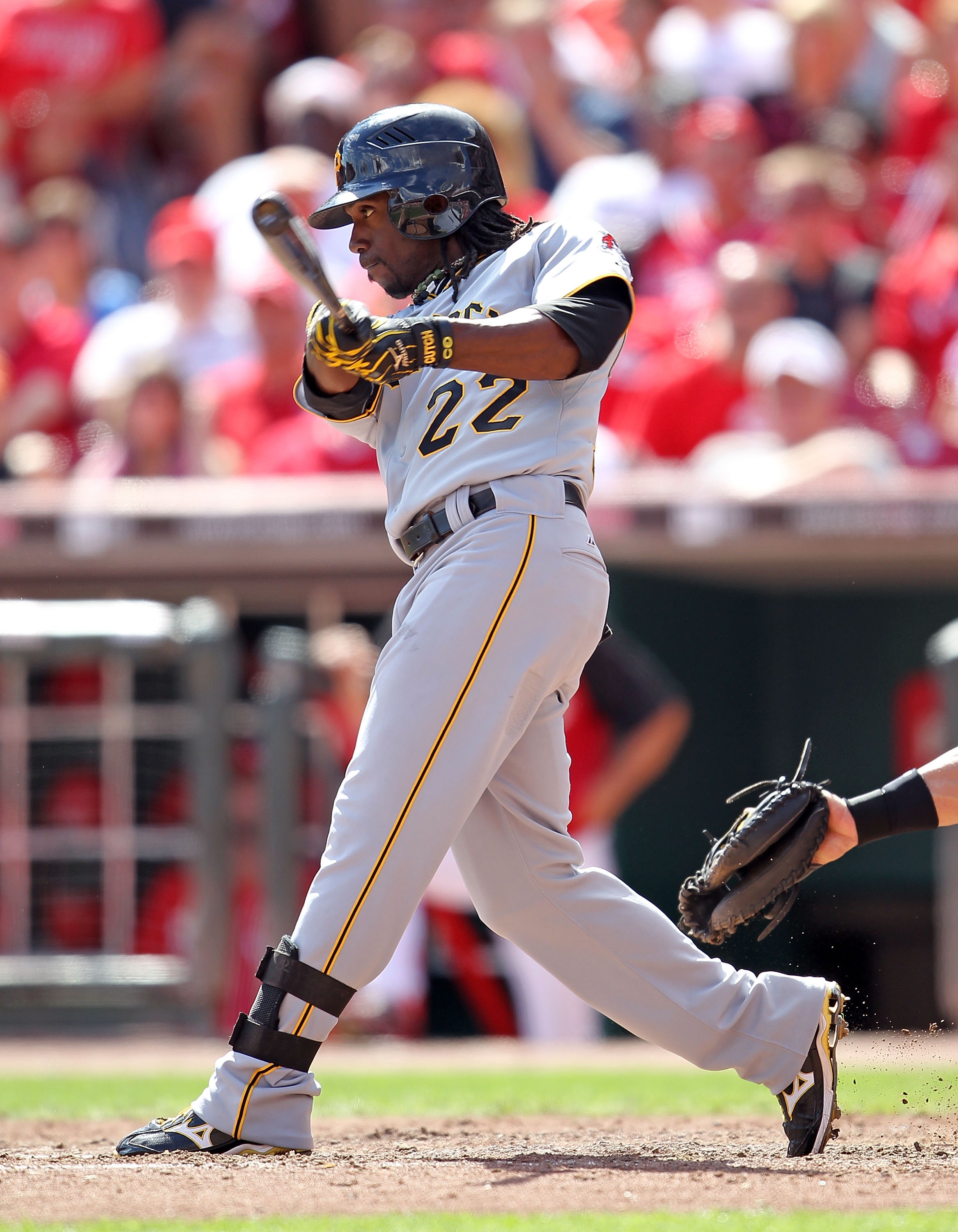 CINCINNATI - SEPTEMBER 12:  Andrew McCutchen #22 of the Pittsburgh Pirates swings at a pitch during the game against the Cincinnati Reds at Great American Ballpark on September 12, 2010 in Cincinnati, Ohio. He hit a three run double in the ninth inning to