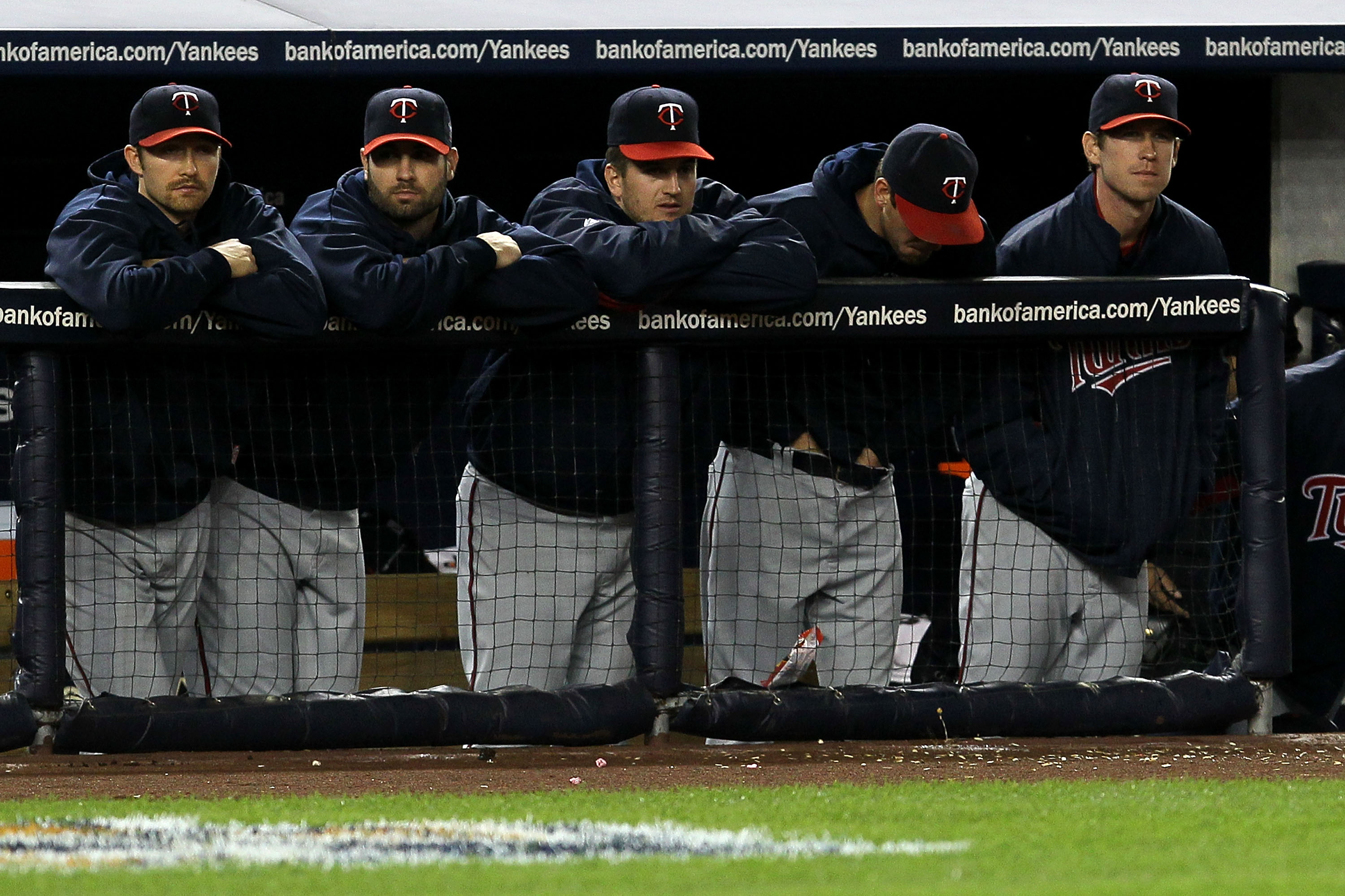 NEW YORK - OCTOBER 09:  Members of the Minnesota Twins look on dejected from the dugout late in the game against the New York Yankees during Game Three of the ALDS part of the 2010 MLB Playoffs at Yankee Stadium on October 9, 2010 in the Bronx borough of