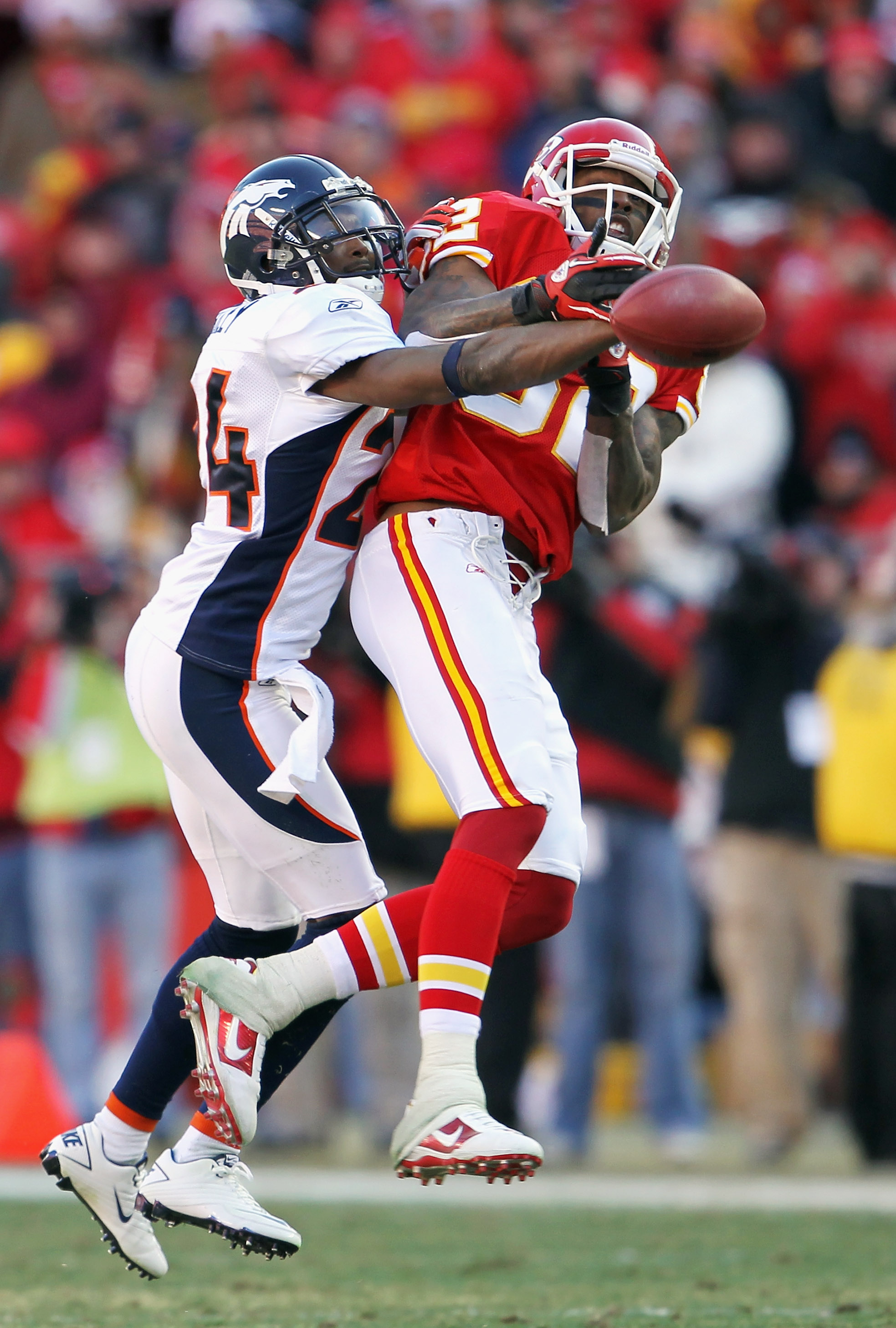 KANSAS CITY, MO - DECEMBER 05:  Champ Bailey #24 of the Denver Broncos breaks up a pass intended for Dwayne Bowe #82 of the Kansas City Chiefs during the game on December 5, 2010 at Arrowhead Stadium in Kansas City, Missouri.  (Photo by Jamie Squire/Getty