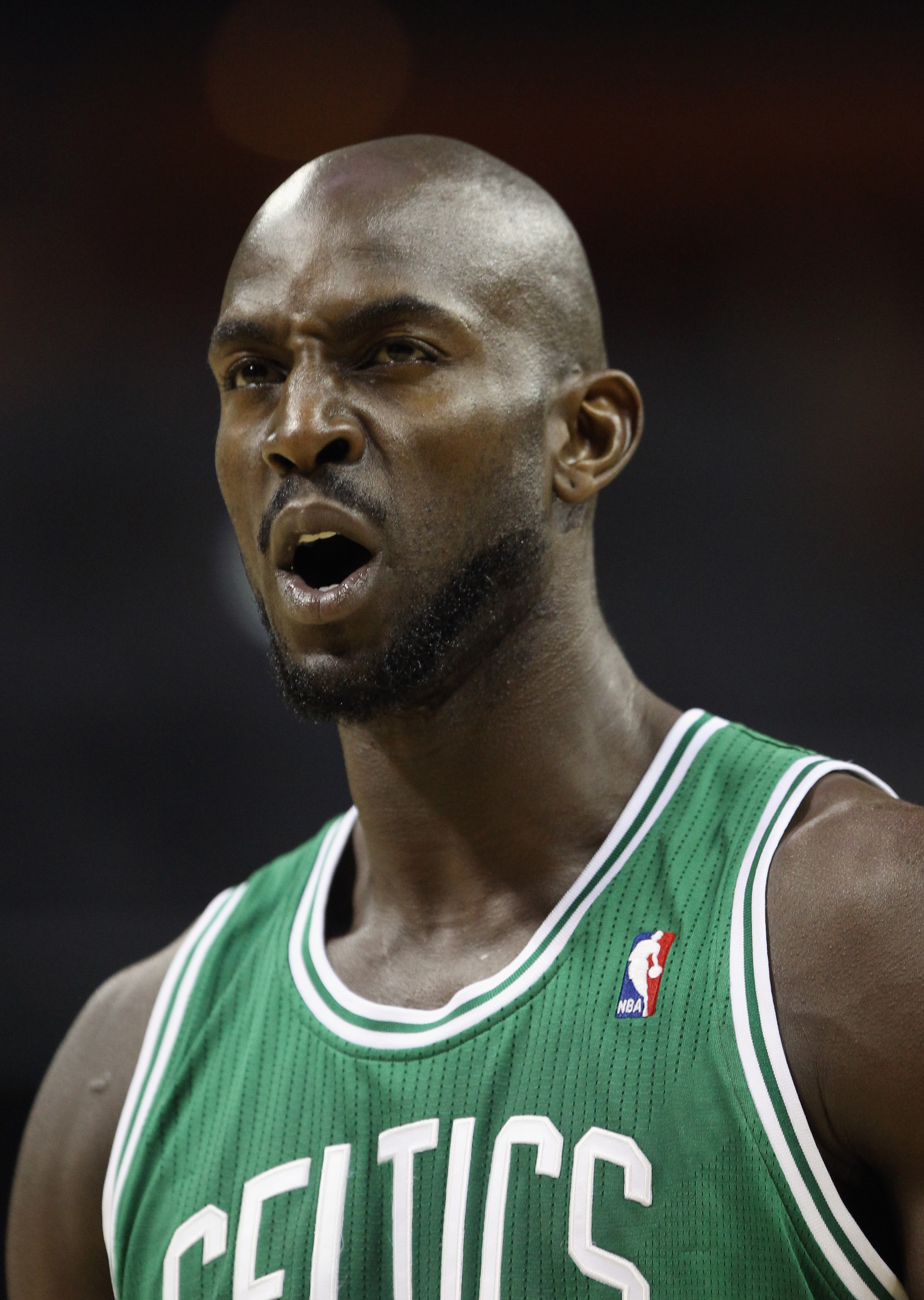 Boston Celtics forward Kevin Garnett (L) forces Denver Nuggets guard Allen  Iverson to pass off on a drive to the basket in the second half at the  Pepsi Center in Denver on