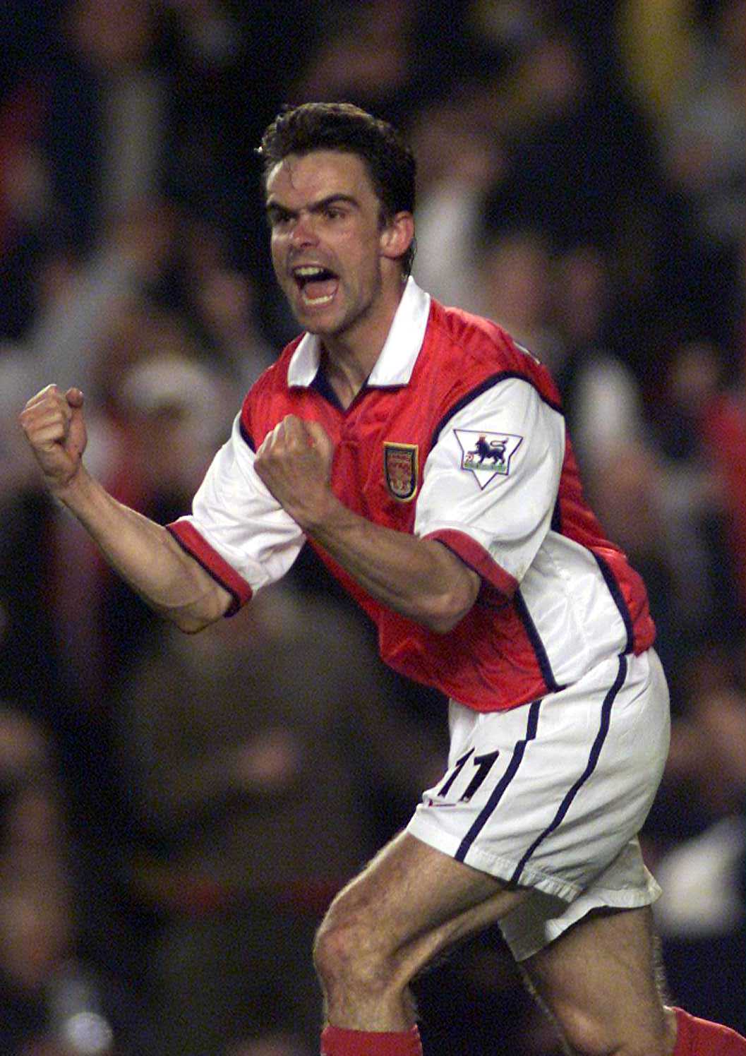 2 May 2000:  Marc Overmars of Arsenal celebrates scoring the equalizing goal  during the match between Arsenal and West Ham United in the FA Carling Premiership at Highbury, London.  Mandatory Credit: Laurence Griffiths/ALLSPORT
